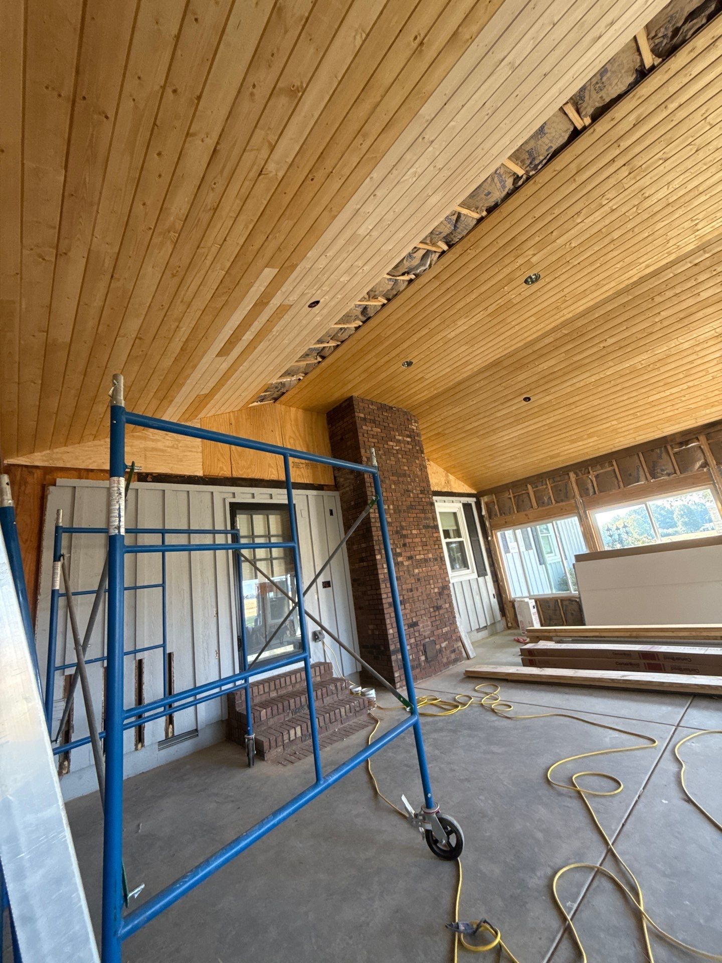 Sunroom and Garage Addition by Skilled Construction LLC