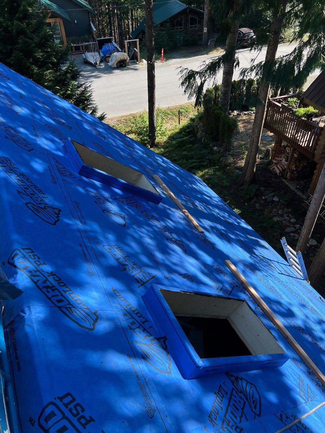 Residential ReRoofing Installation using 12" Prolok metal  by Top Notch Roofing Inc