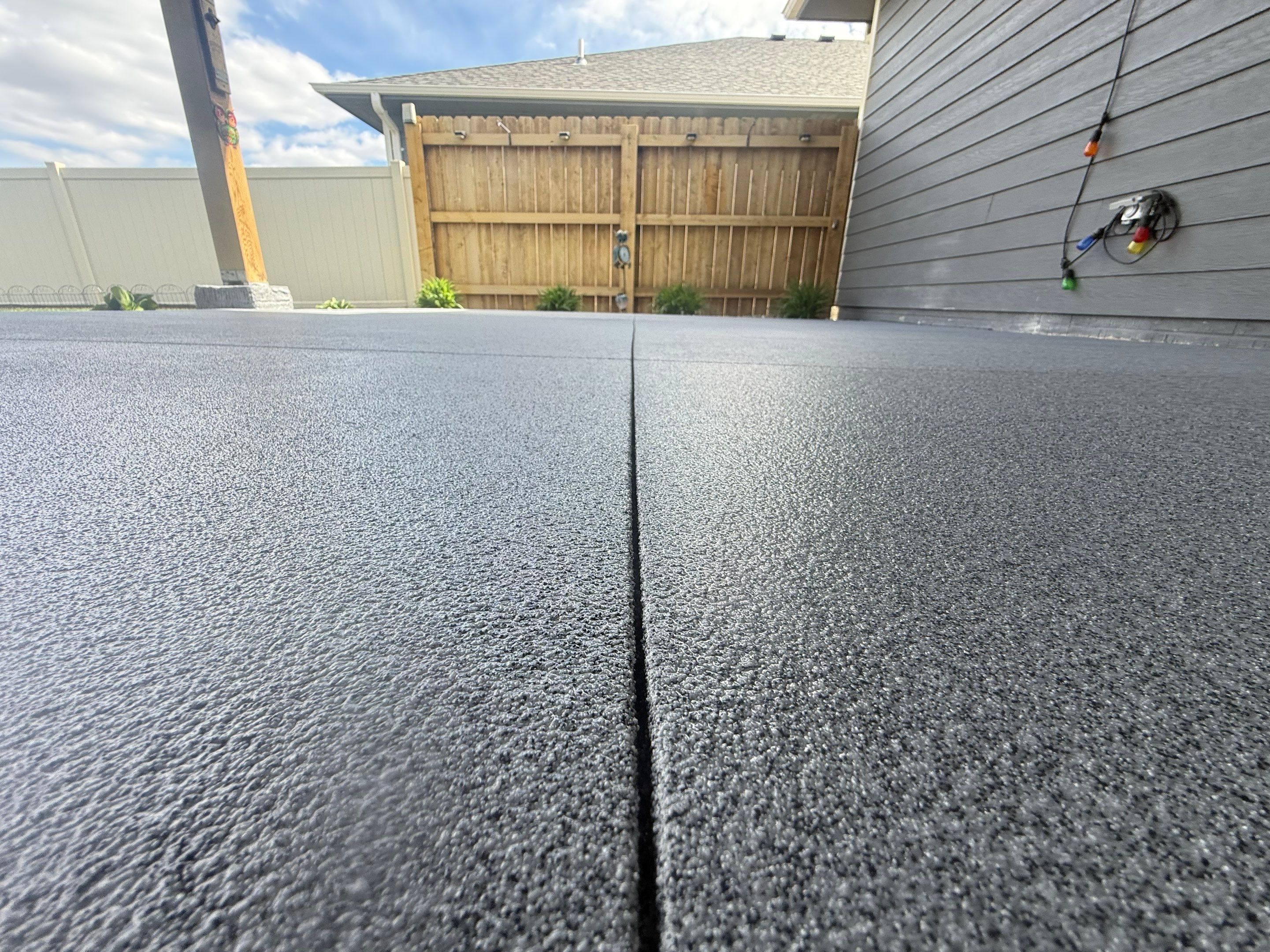 Decorative Flake Concrete Coating for Sioux Falls Porch and Patio by Select Painting, Coatings & Garage Cabinets