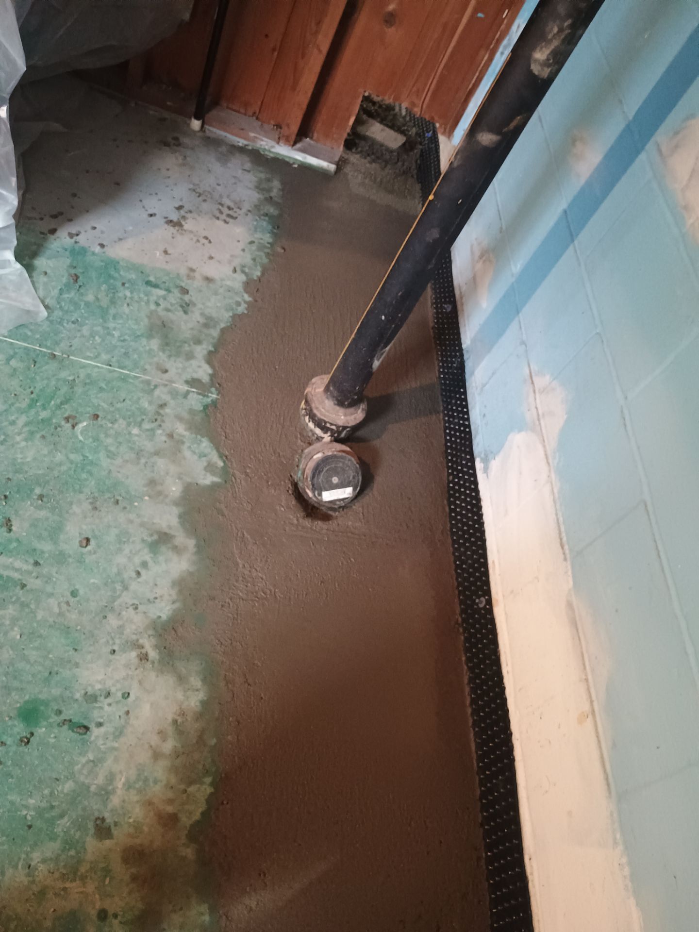 Completing the Connection for Lisa's Drain Tile System by Waterproofing Northeast