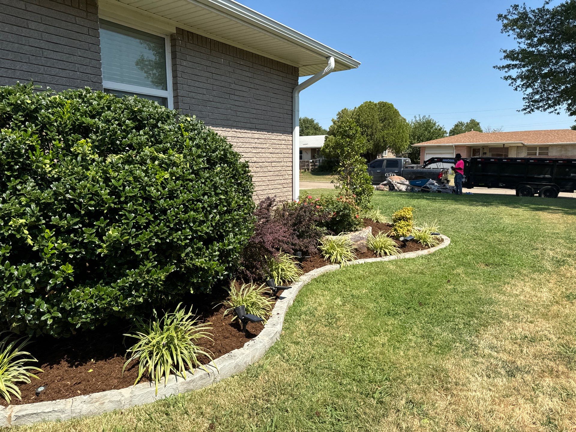 Landscape using Crepe Myrtle Plant by Clays Services Inc
