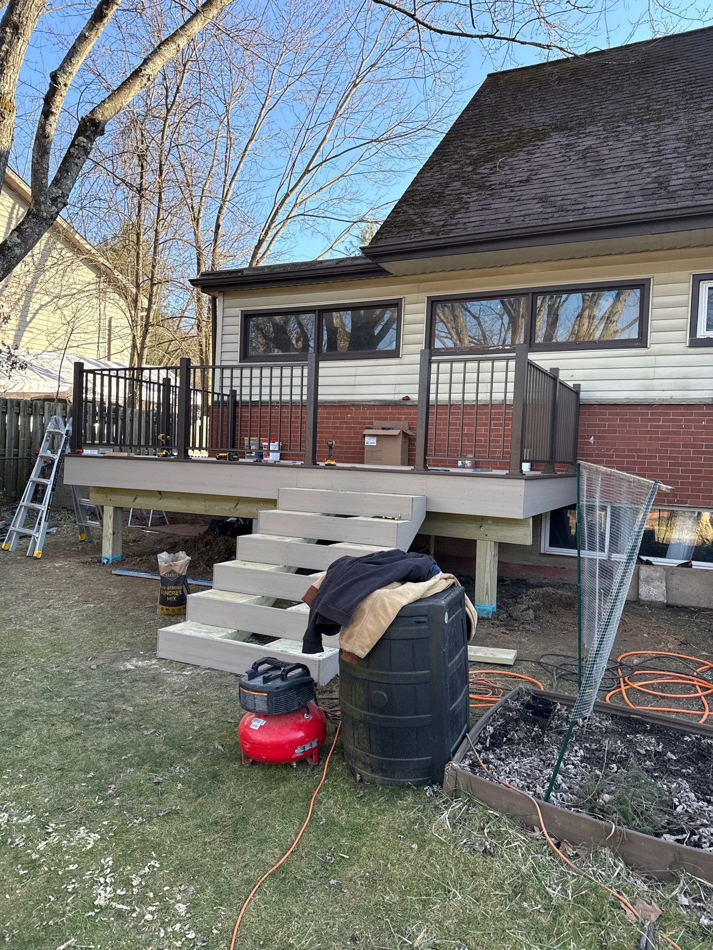Deck and door install by Cousins Roofing Siding & Decks