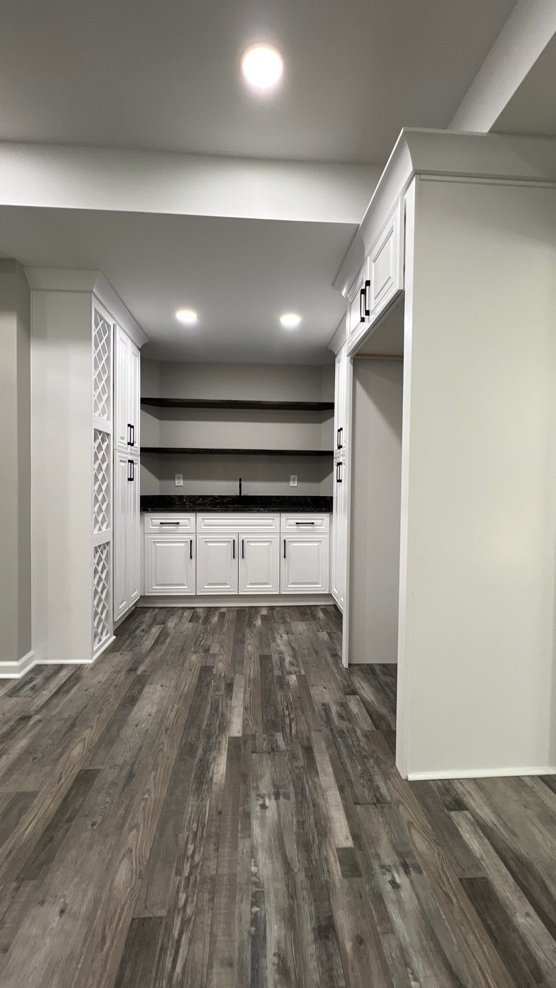 Modern Basement Finishing Project in Acworth Featuring Custom Wet Bar by Swift Home Renovations