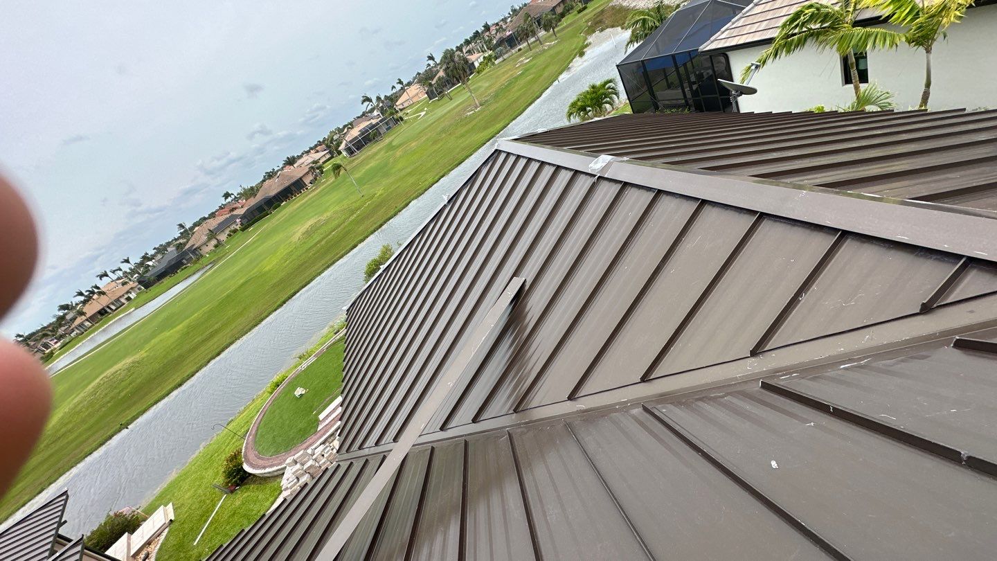 Residential Roofing Installation using Standing Seam Metal Roof in Cape Coral, FL by International Roofing