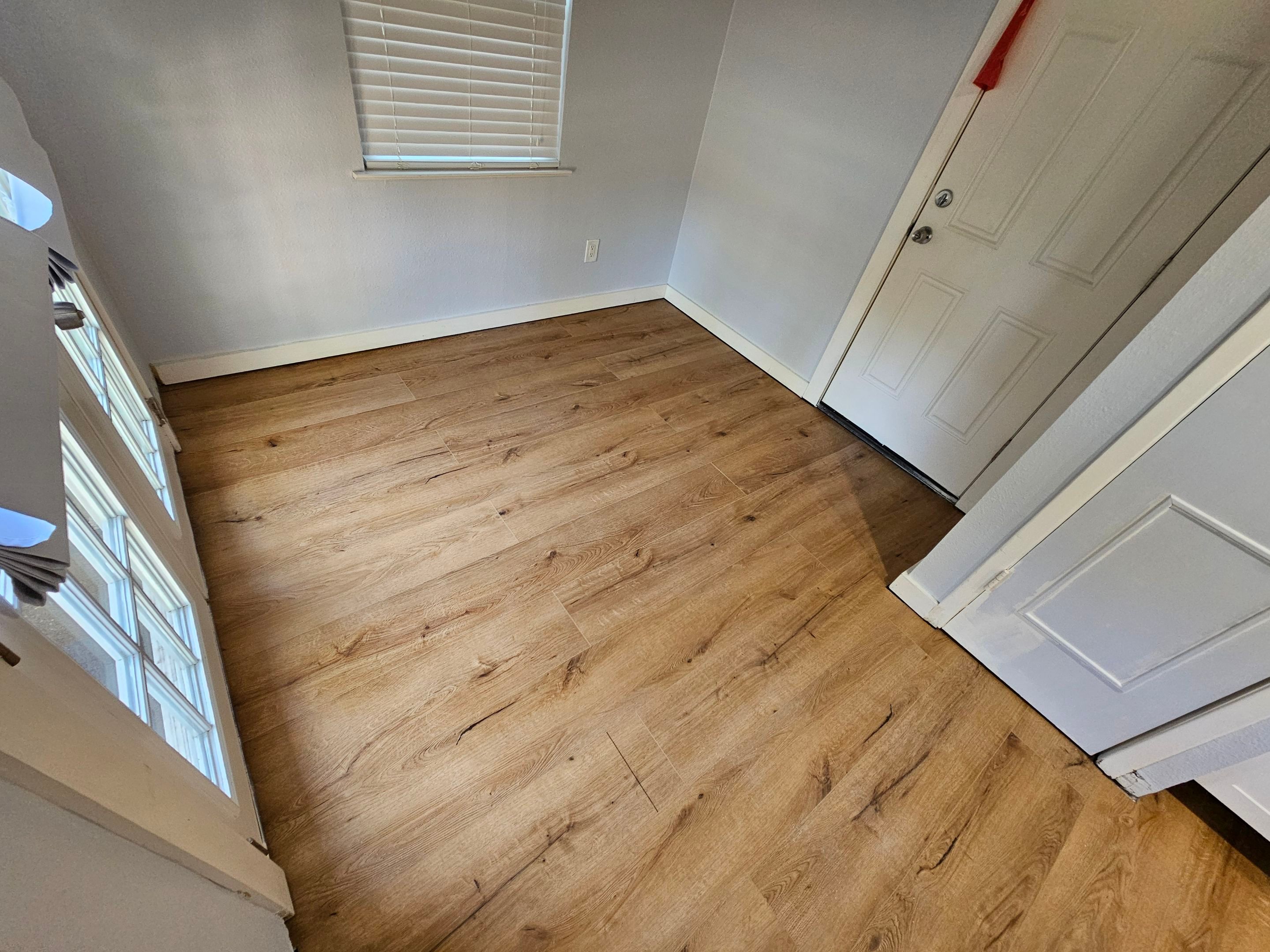 Laminate floor & fence by EL-GC LLC 