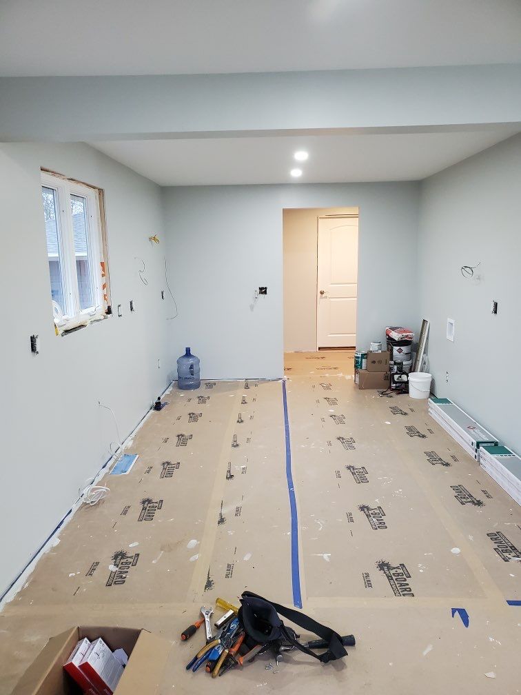 Interior Renovations, Kitchen Remodel, and Window Replacement by Ivy Lea Construction