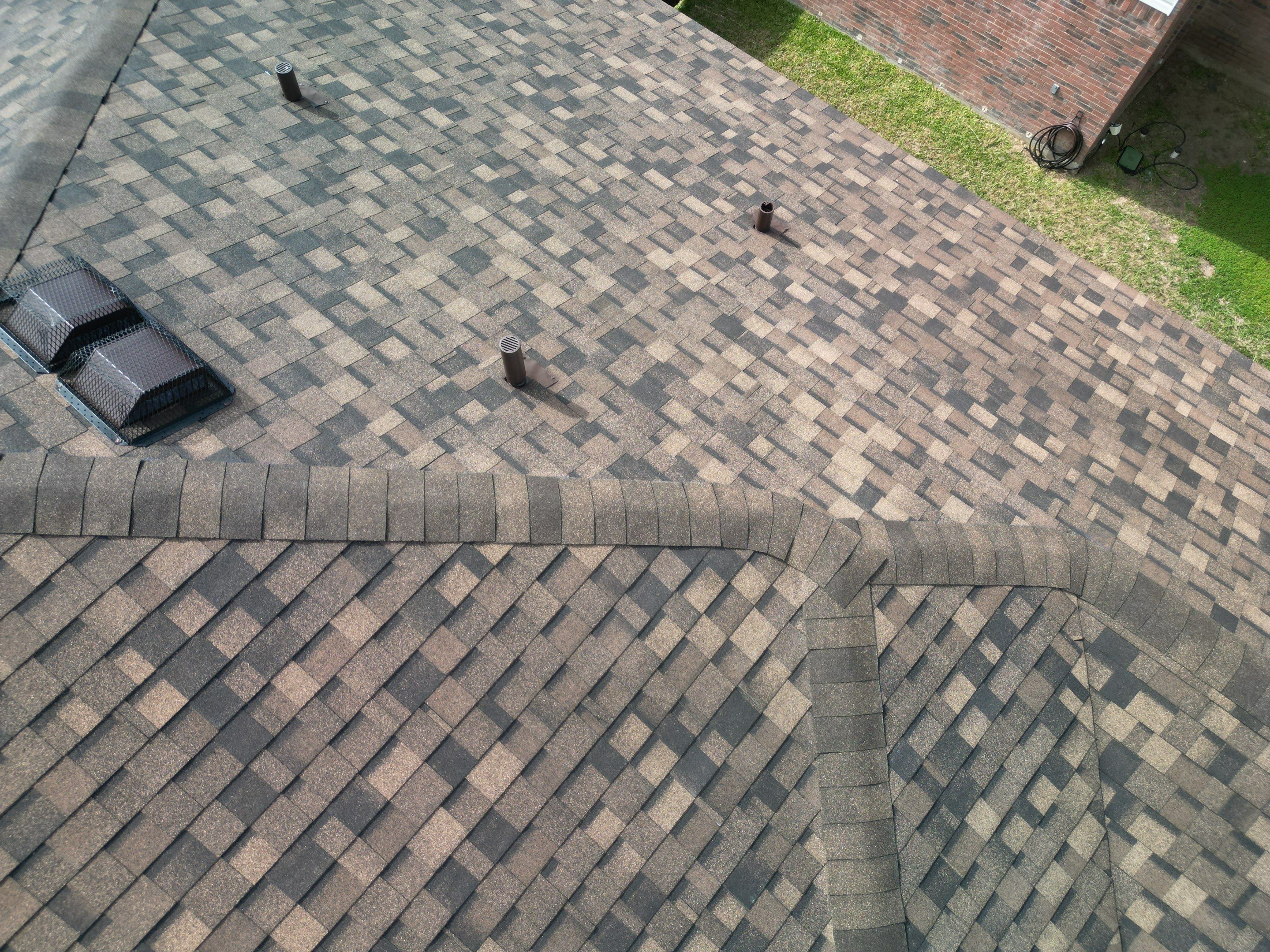 Full Roof Replacement, Chimney Rebuild and Interior Damage Replacement by First United Roofing & Construction