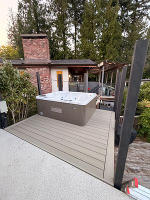 New Composite Deck with glass railing in North Vancouver