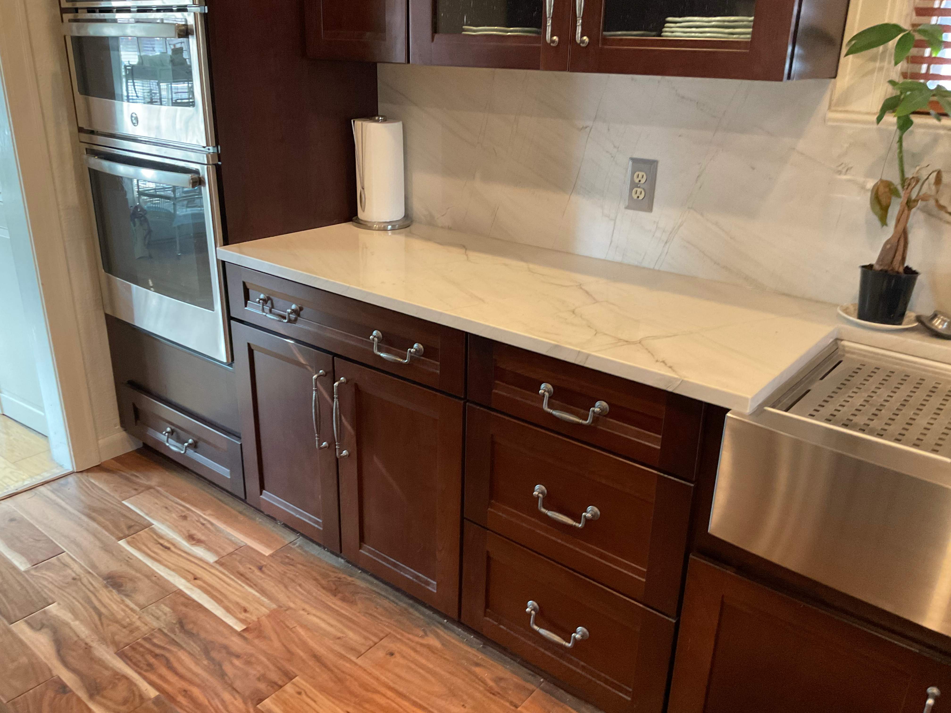 San Antonio Kitchen and Bathroom Remodel Featuring Marble-Patterned Tiles by Mena stone surfaces