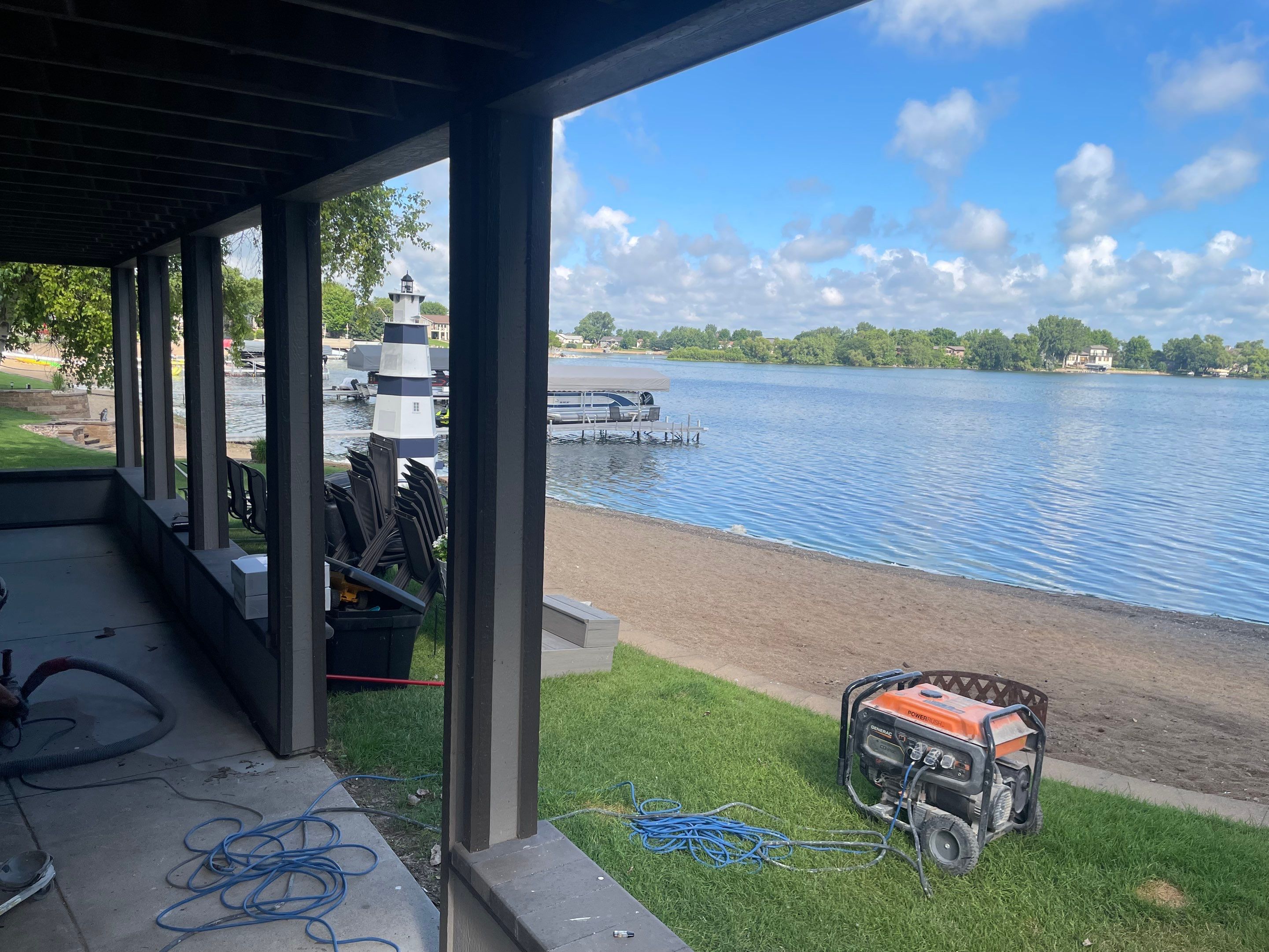 Lakefront Screened Patio Concrete Coating Installation in Wentworth by Select Painting, Coatings & Garage Cabinets