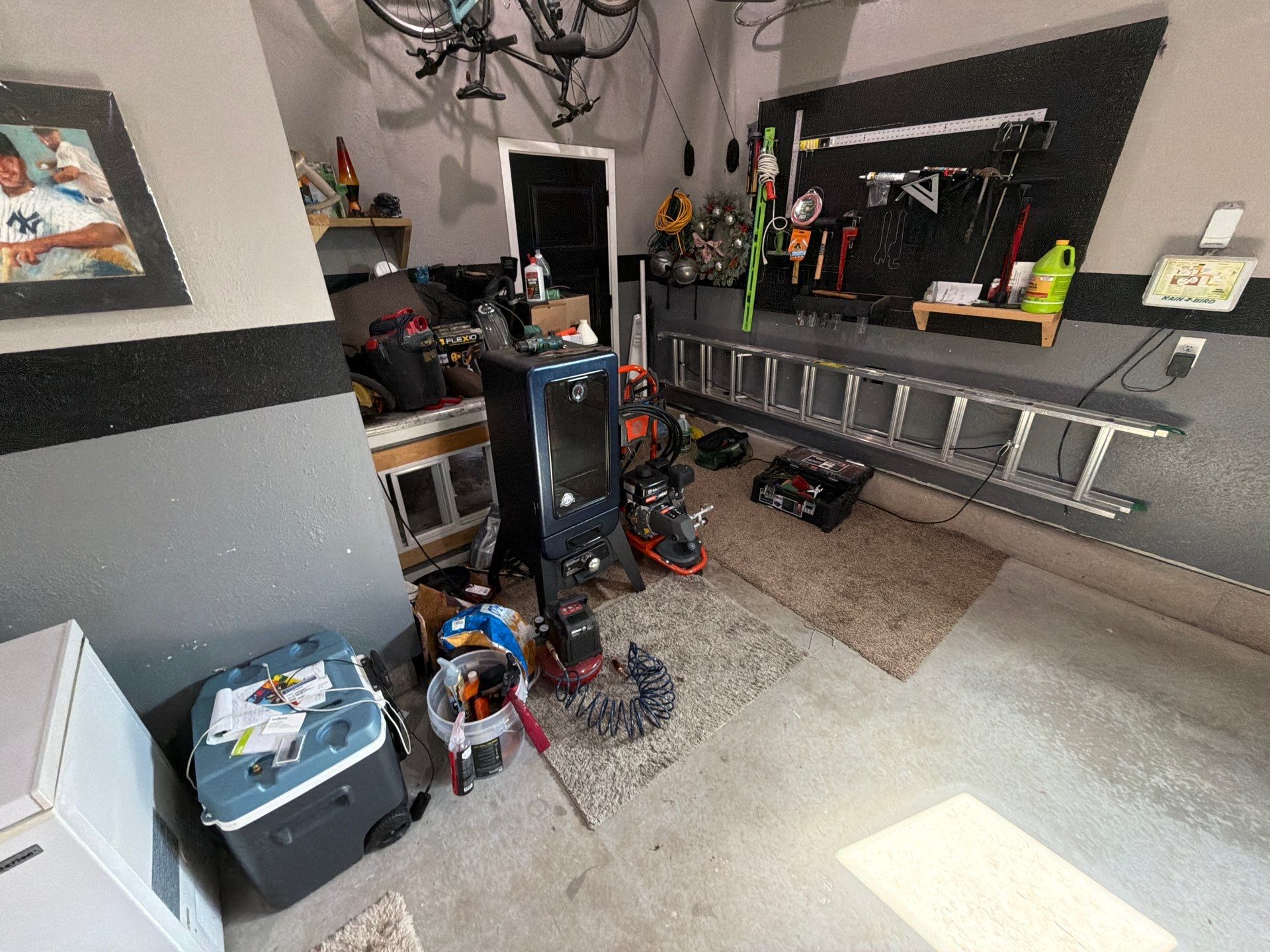 Custom Gray Flake Garage Floor Coating in Sioux Falls by Select Painting, Coatings & Garage Cabinets