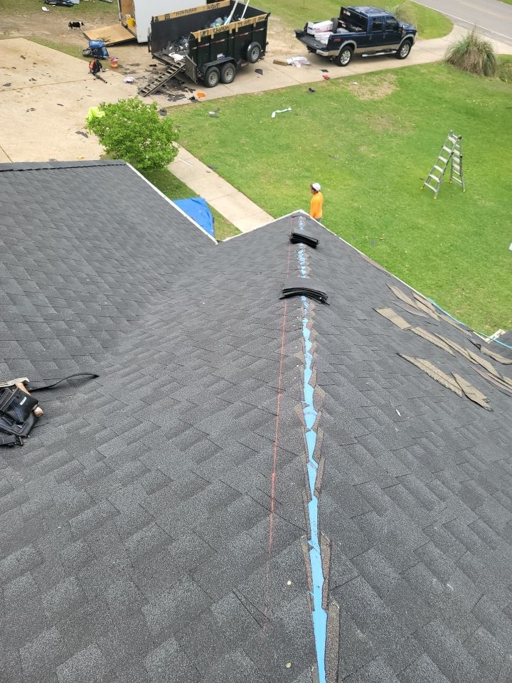 Residential Roofing Installation using Roof Replacement by American Roofing & Construction LLC