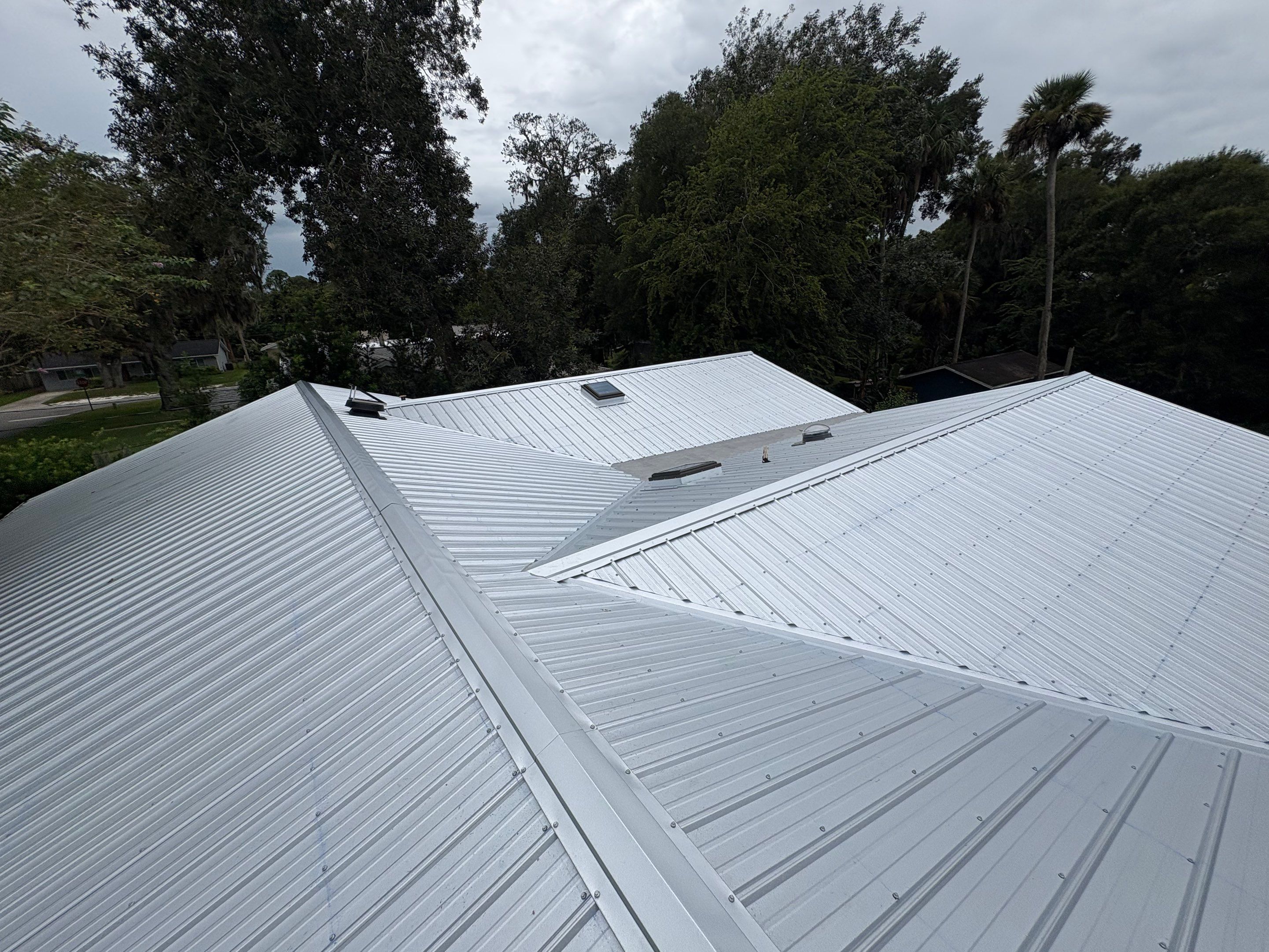 Residential Metal Roofing Installation with Ultra Rib Panels in New Smyrna Beach by Pinnacle Roofing Group