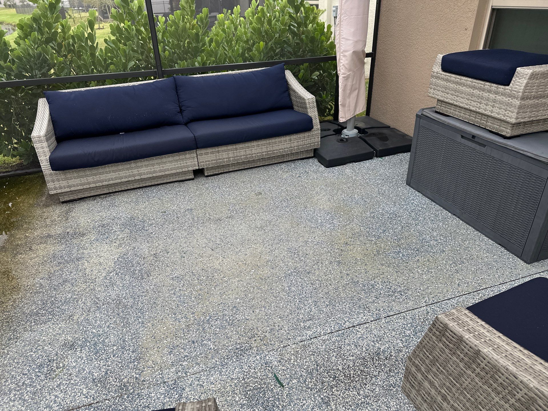 Lanai & Patio Cleaning with Epoxy-Coated Concrete Floor in Trevesta Community, Palmetto, FL | Sunshine AquaWash by Sunshine AquaWash