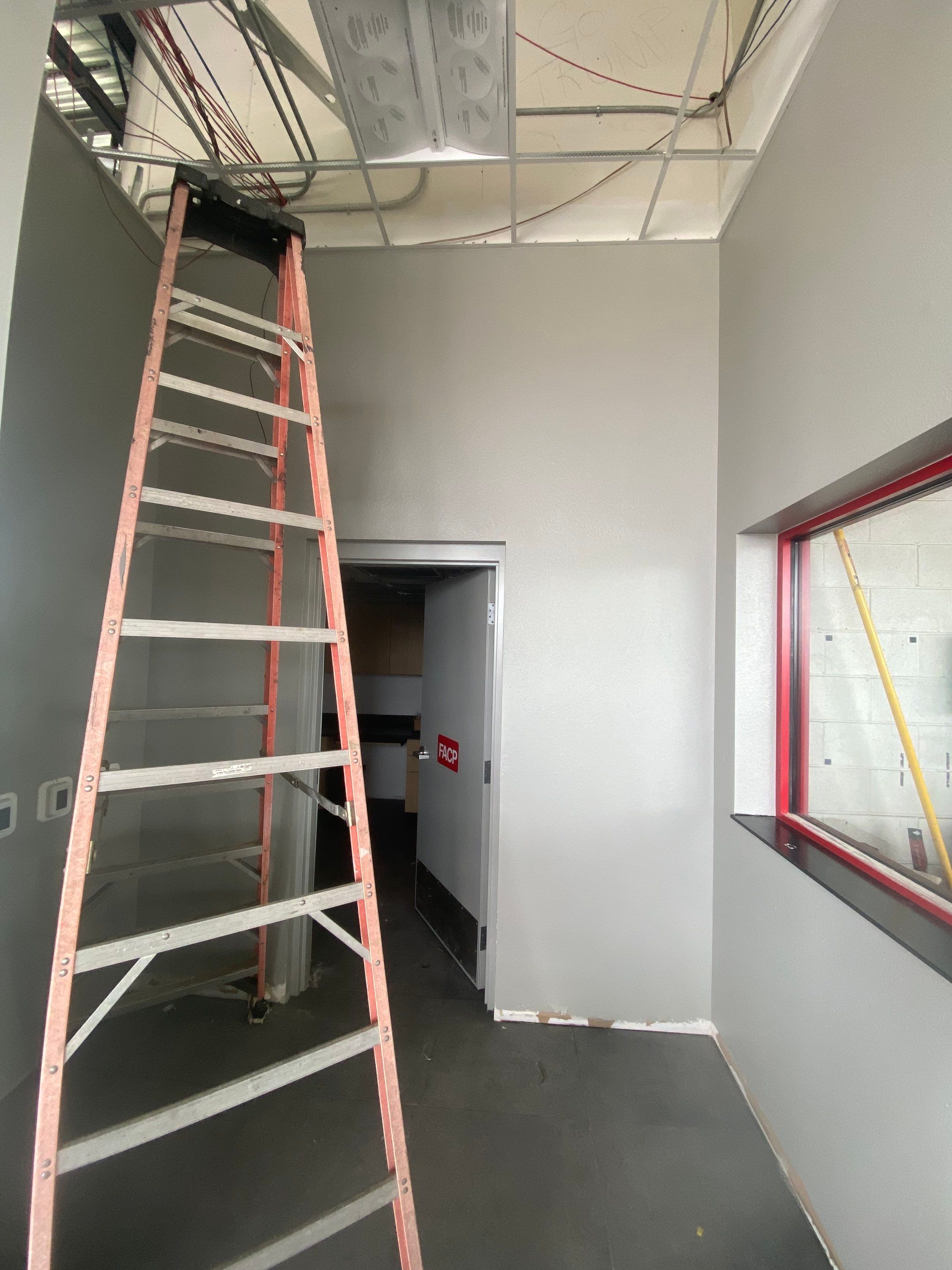 Commercial Interior Repaint for Remodel of Discount Tire in Wichita, KS by Midwest Paint LLC