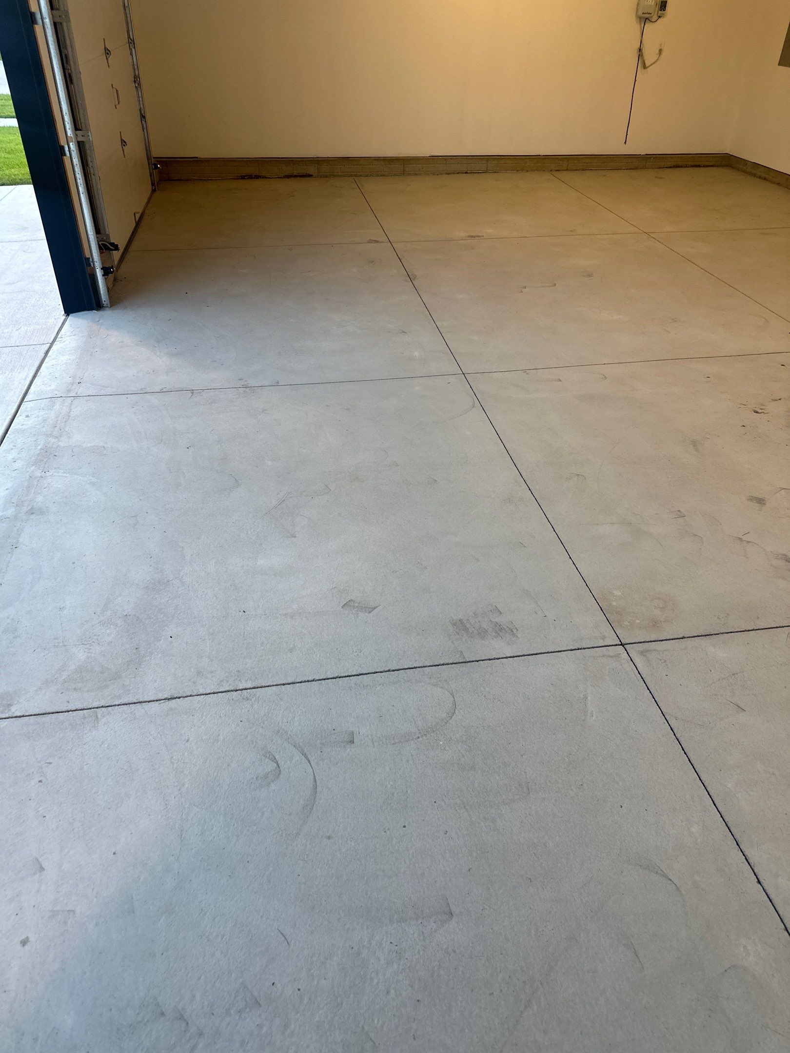 Black and White Speckled Epoxy Garage Floor in Lincoln by Goat Coatings