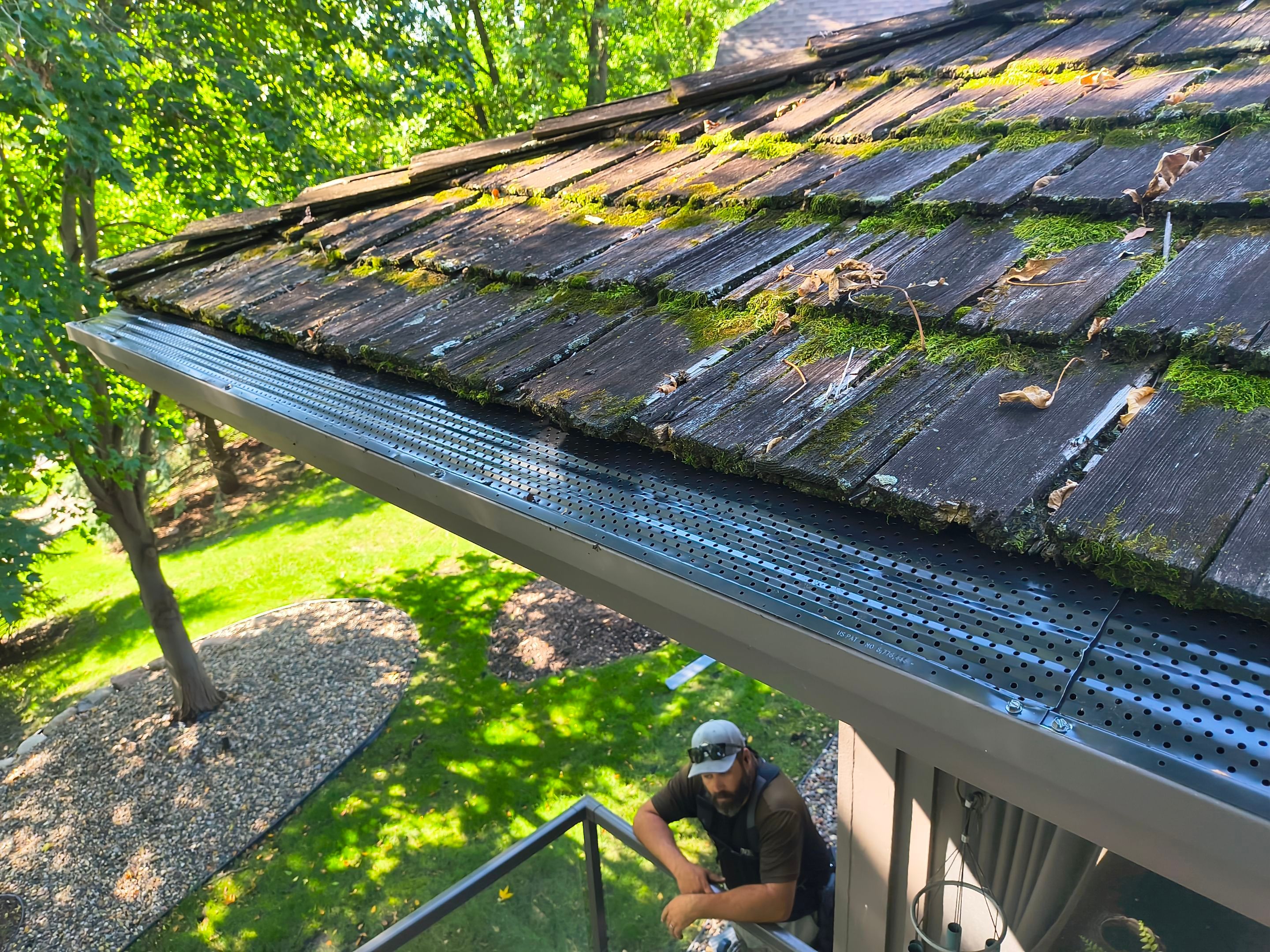 6" Bronze Seamless Gutters with Leaf Exterminator Gutter Protection – Minneapolis, MN by Next Level Seamless Gutters / Exteriors Inc.