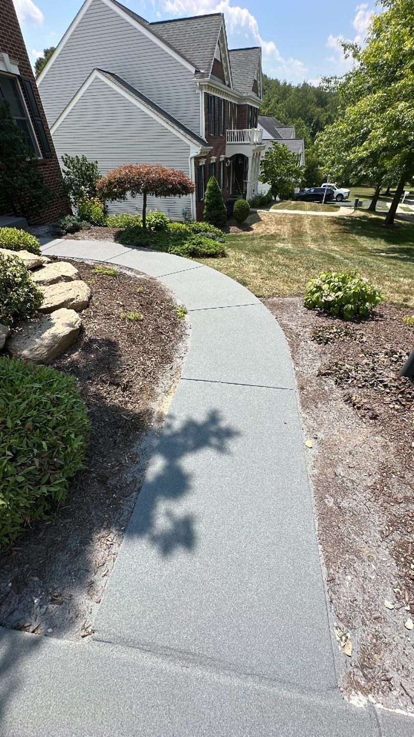 Pool Deck + Driveway + Garage Project in Venetia by Floors in a Day, Inc