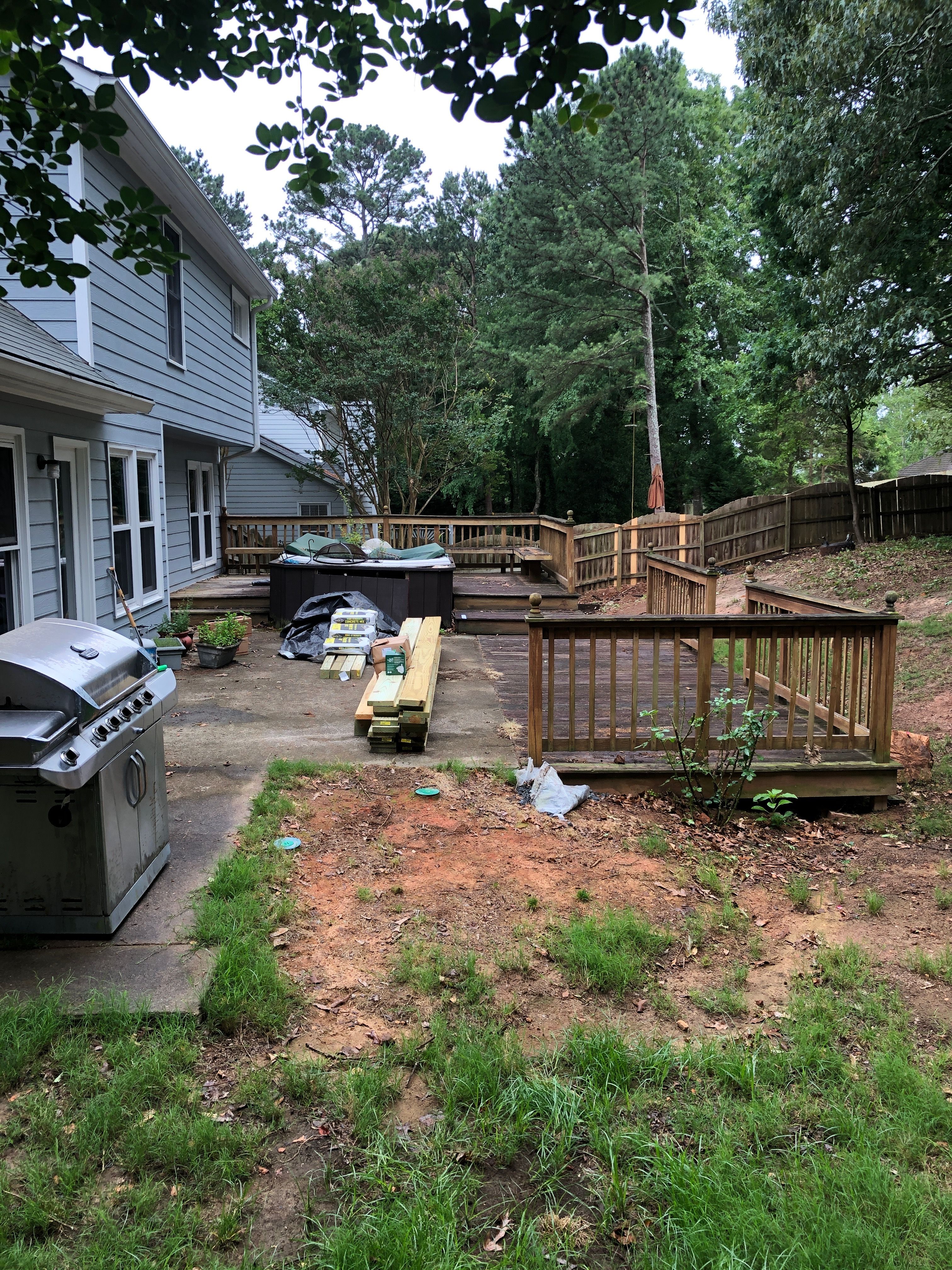 Composite Deck Replacement with White Railings in Duluth by Swift Home Renovations