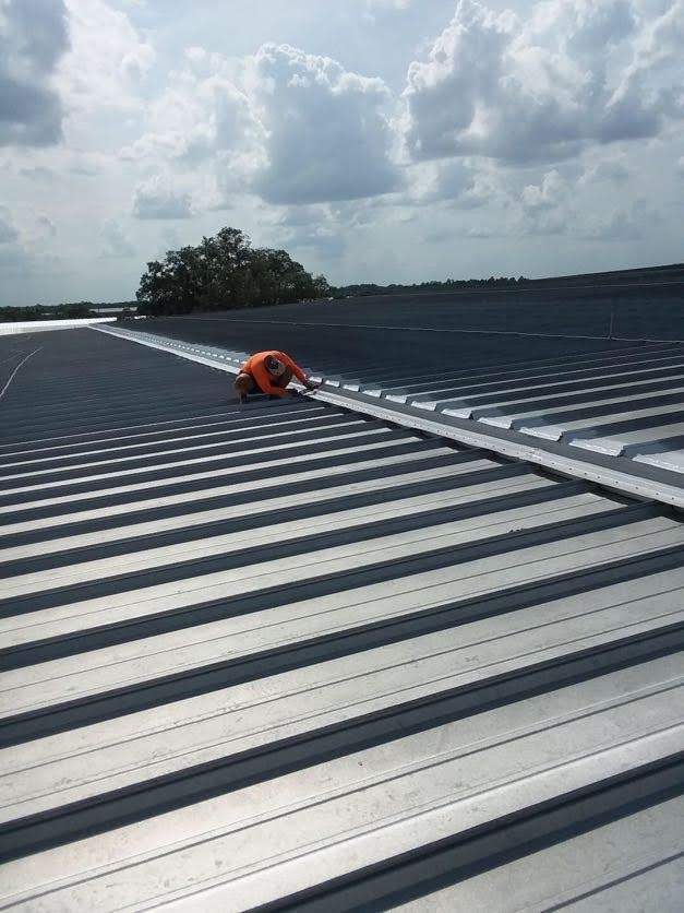 122,220 SQ Ft Standing Seam Metal Roof Restoration in Buford by Southern Roof Solutions