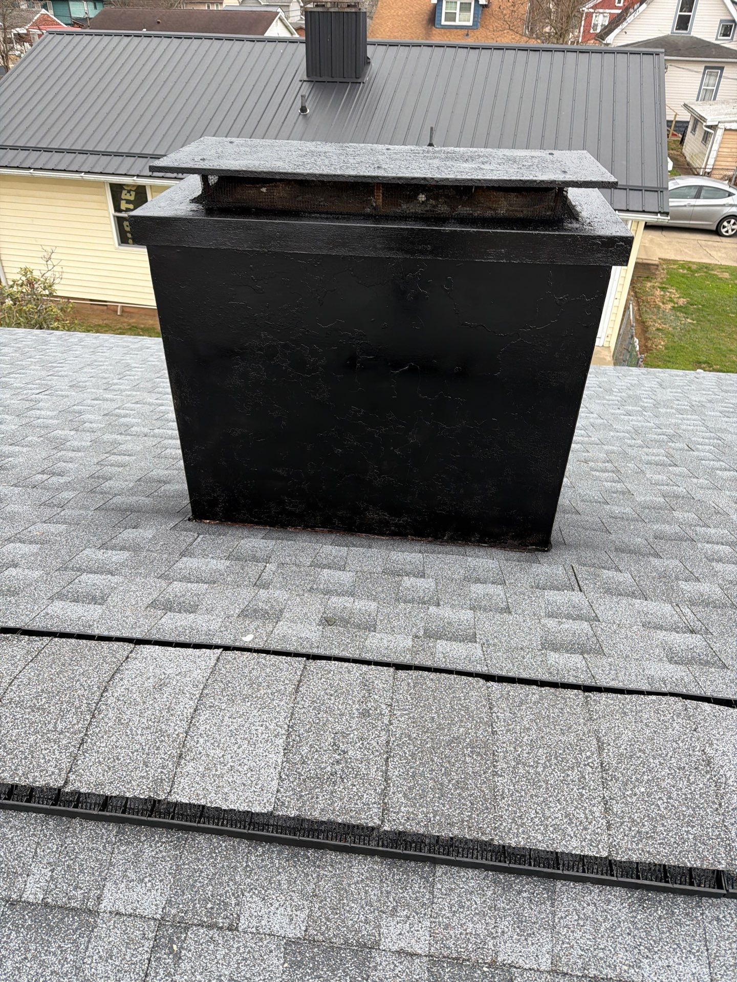 Residential Roofing Installation using EPDM and GAF Timberline HDZ Hickory by Rainstoppers Roofing