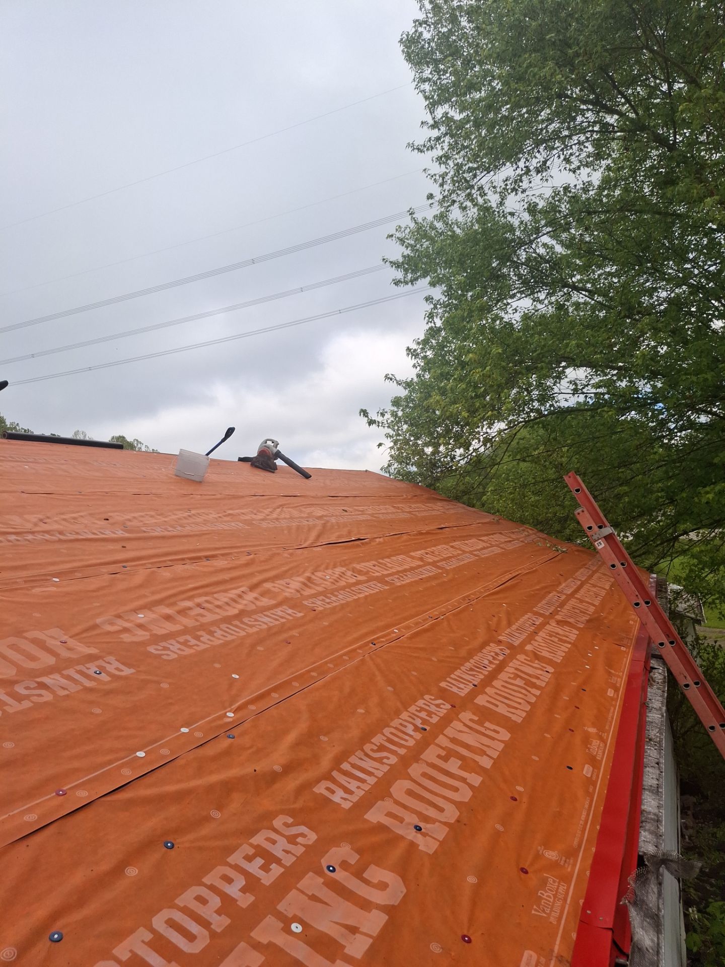 Residential Roofing Installation using Metal by Rainstoppers Roofing