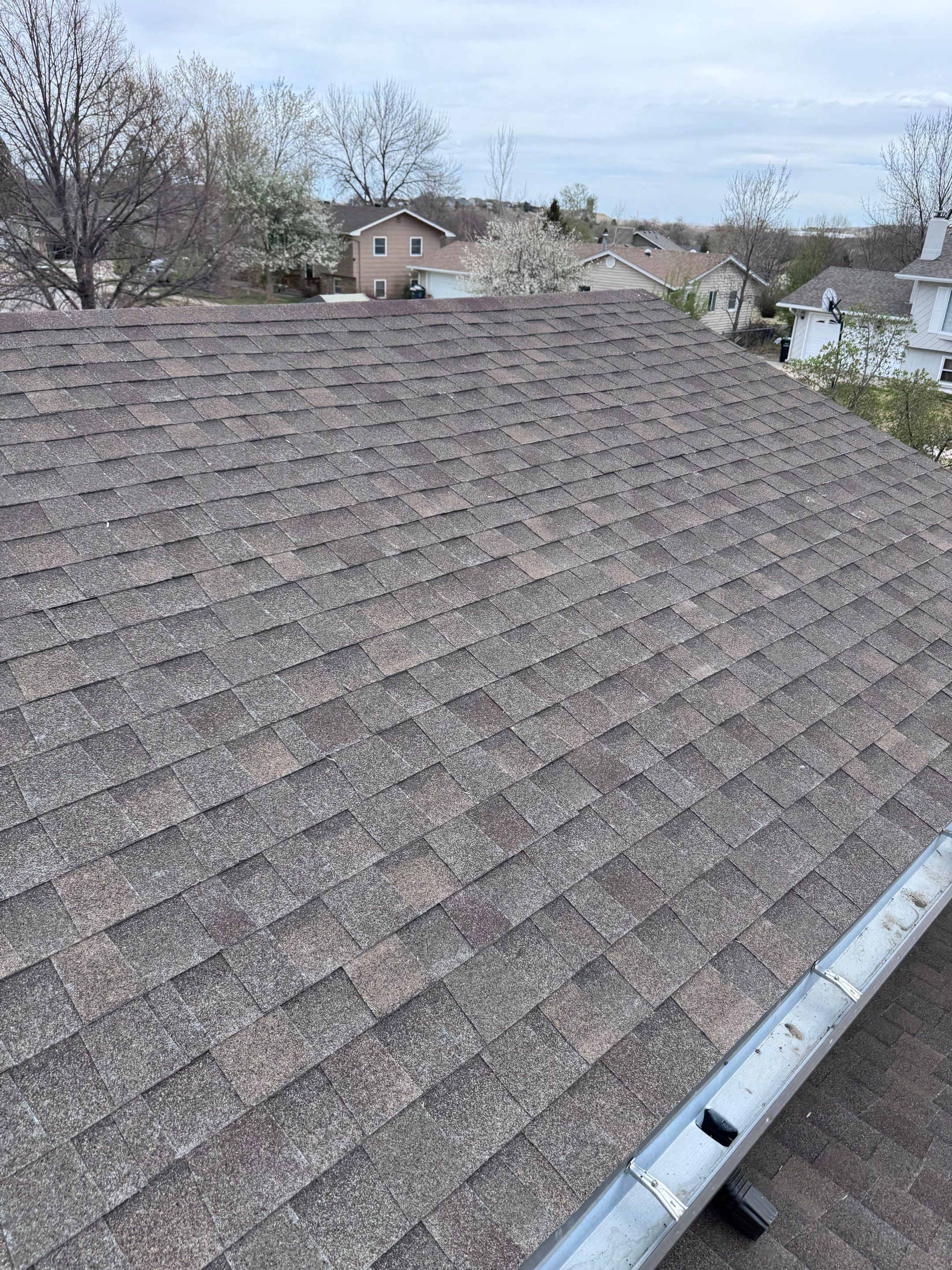 Full Architectural Shingle Roof Replacement and Gutter Installation in Rapid City by Weather-Tite Exteriors LLC