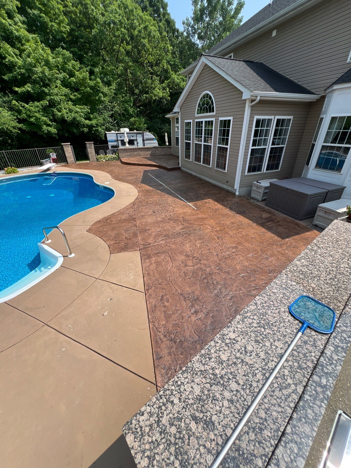 Sidewalk and pool patio Recolor/Reseal  by NG Masonry & Construction LLC