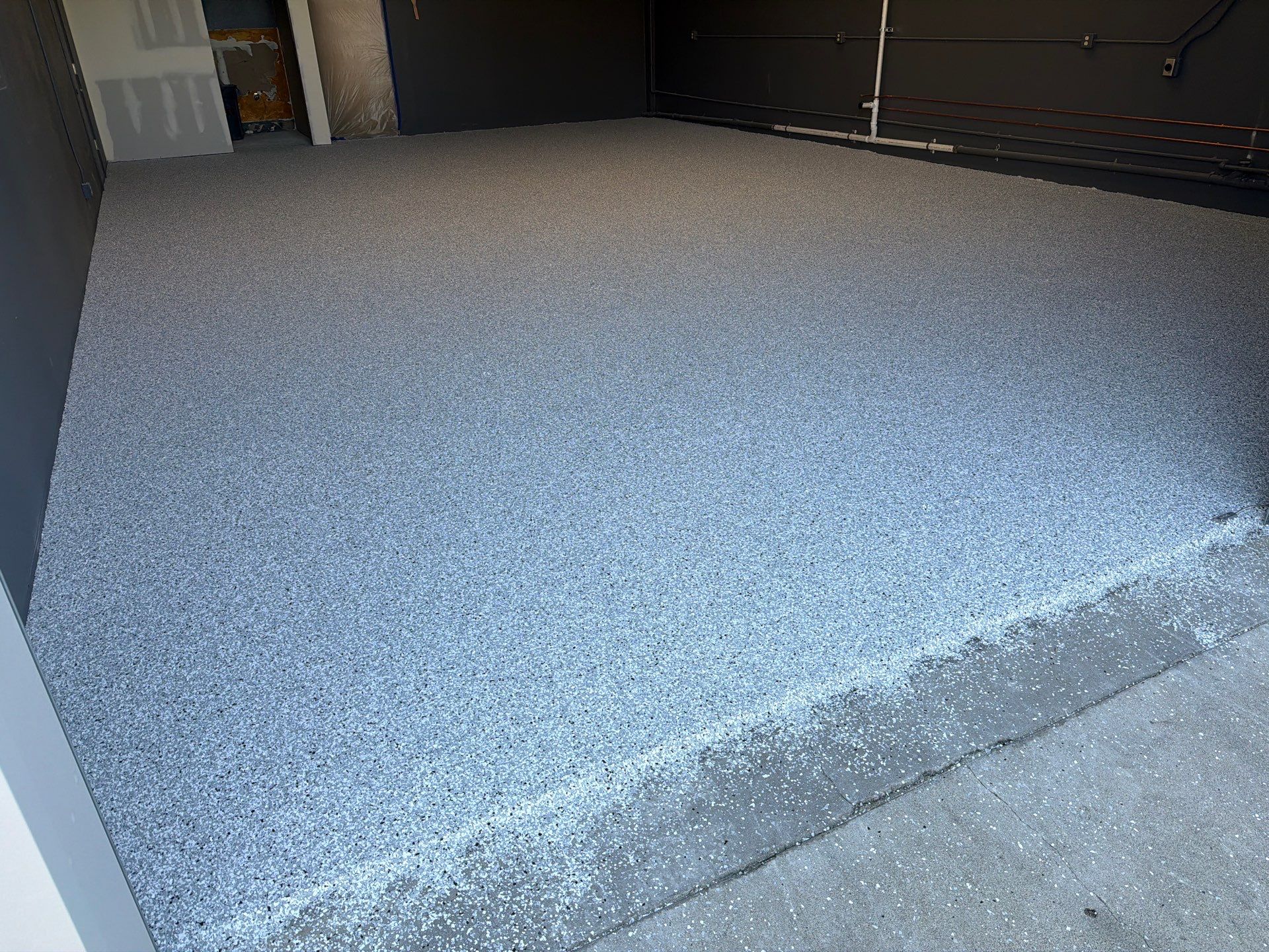 Custom Chip Polyurea Floor Coating for San Luis Obispo Commercial Unit by MGP Coatings