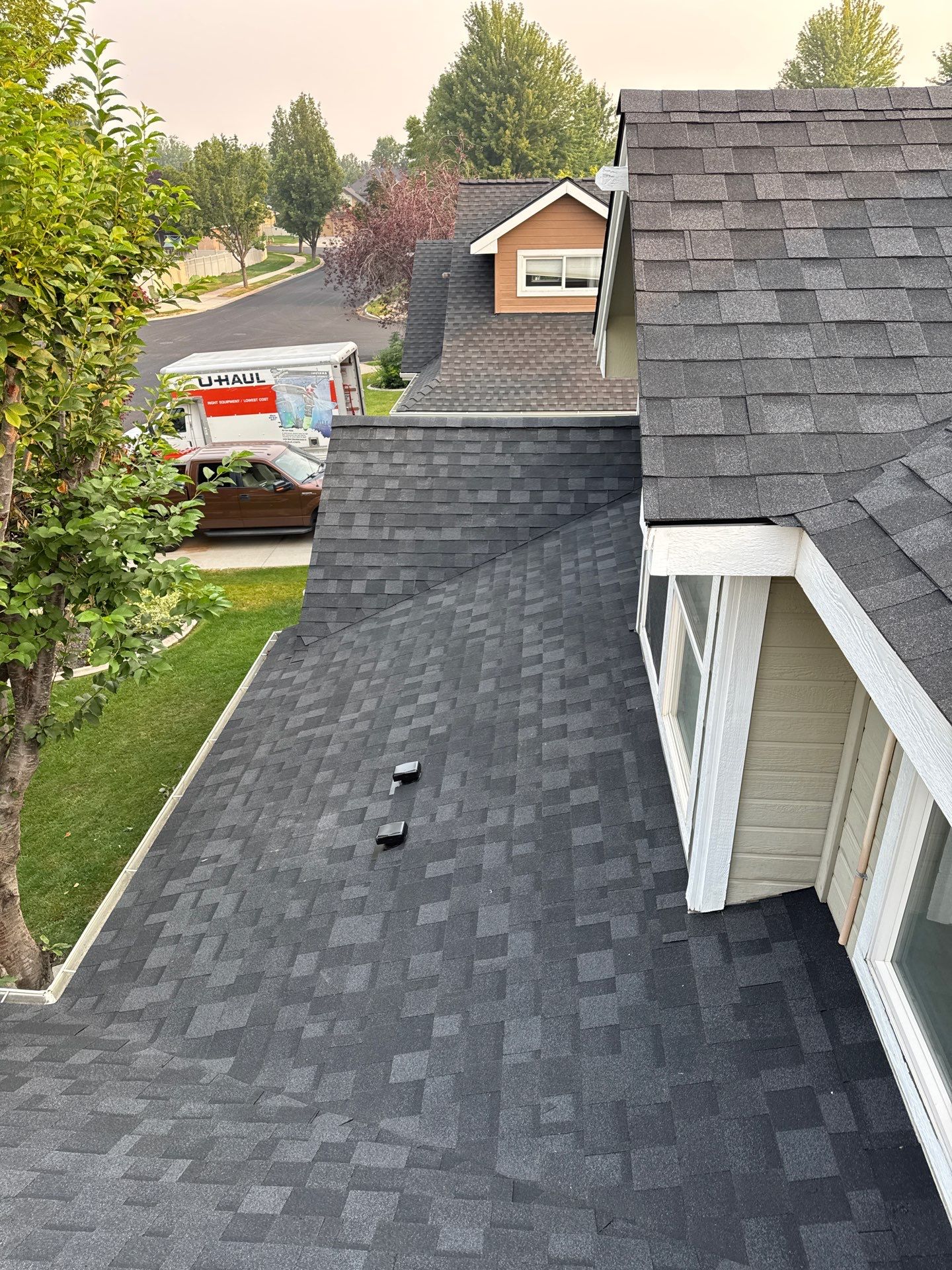 Meridian Residential Roof Replacement Using Dark Gray Architectural Shingles by Olive Roofing