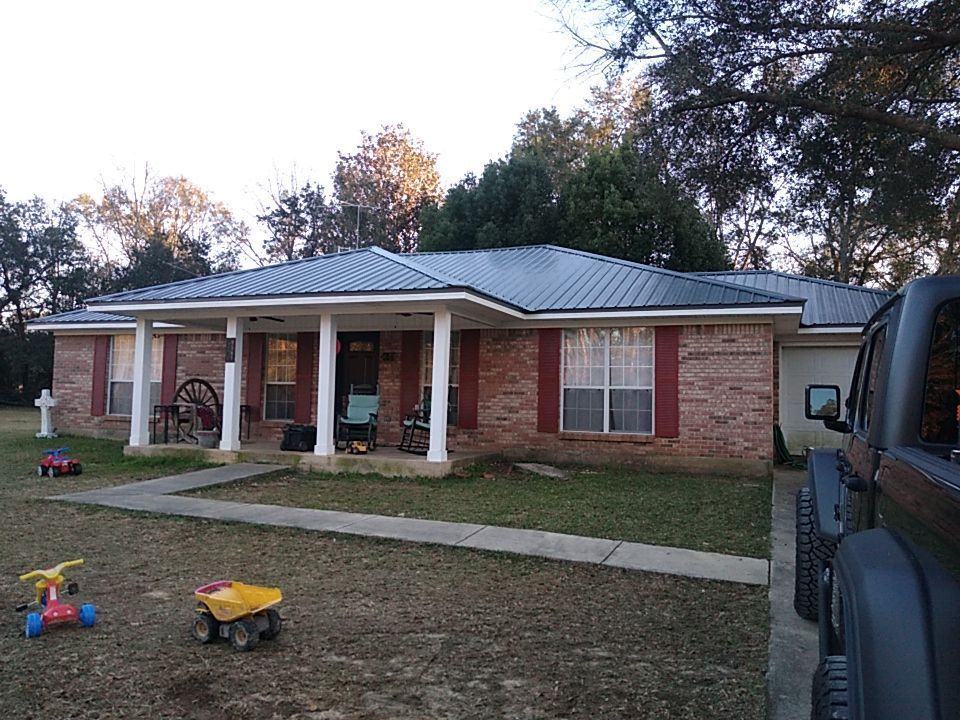 Residential Roofing Installation using Roof Replacement by American Roofing & Construction LLC