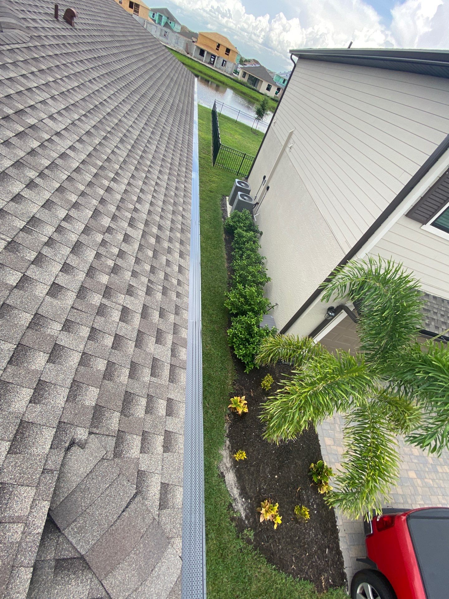 Brown Seamless Gutters for Homes in Fort Myers by Gutter Professors