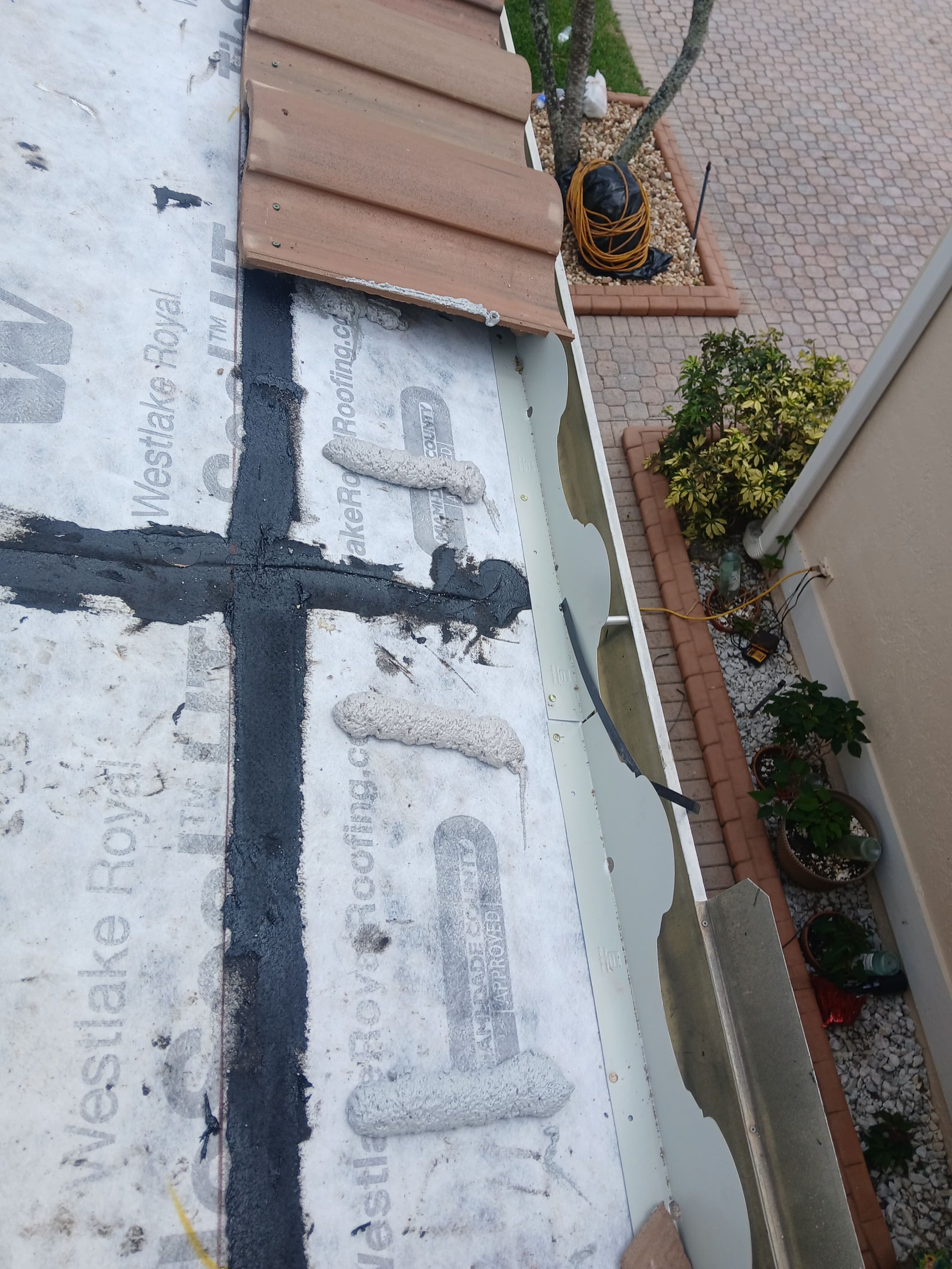 New Barrel Tile Roof Installation and Decking Repair in Boynton Beach by Aastro Roofing