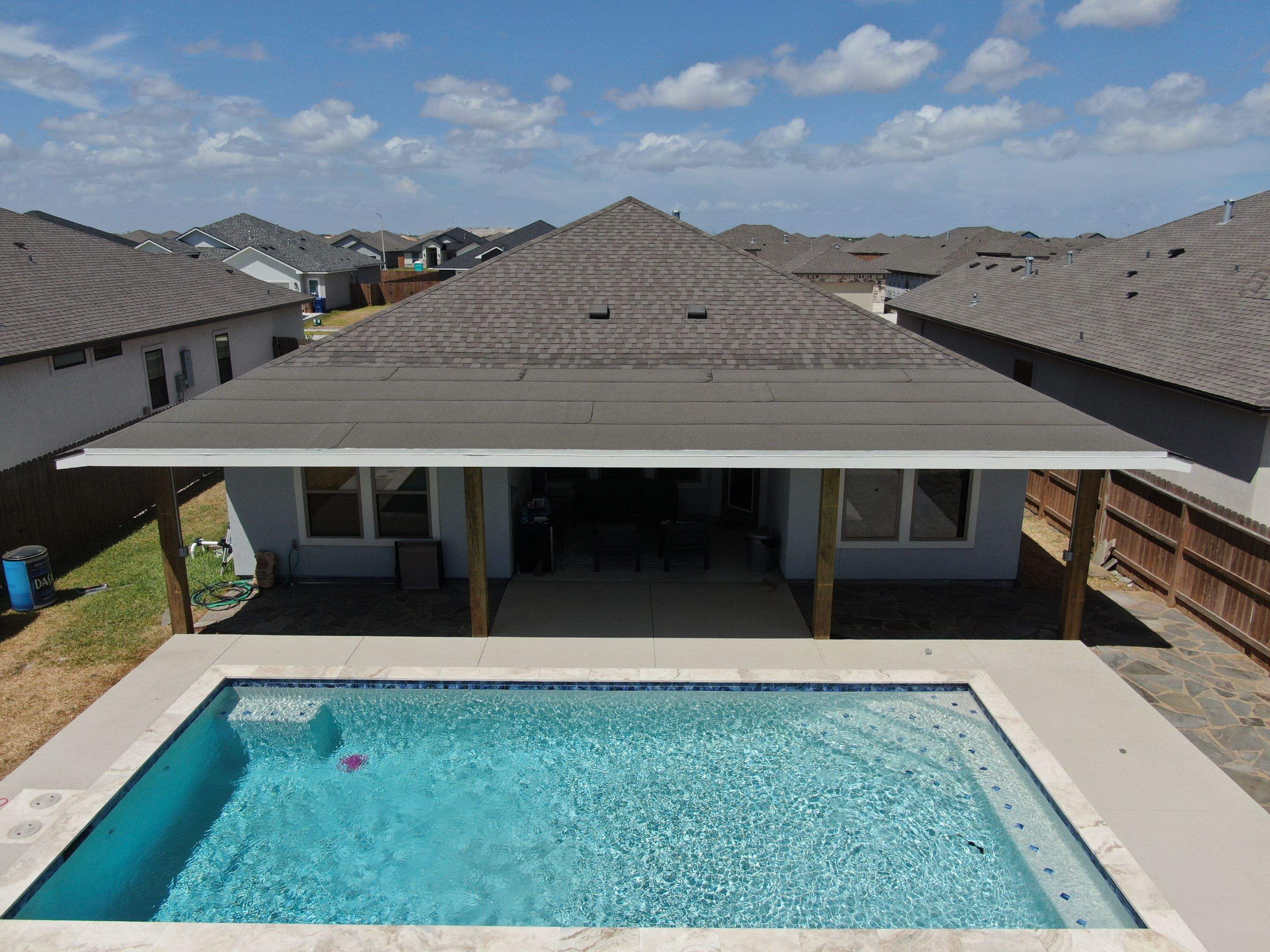 Patio Pool Cover by Bayfront Roofing and Construction