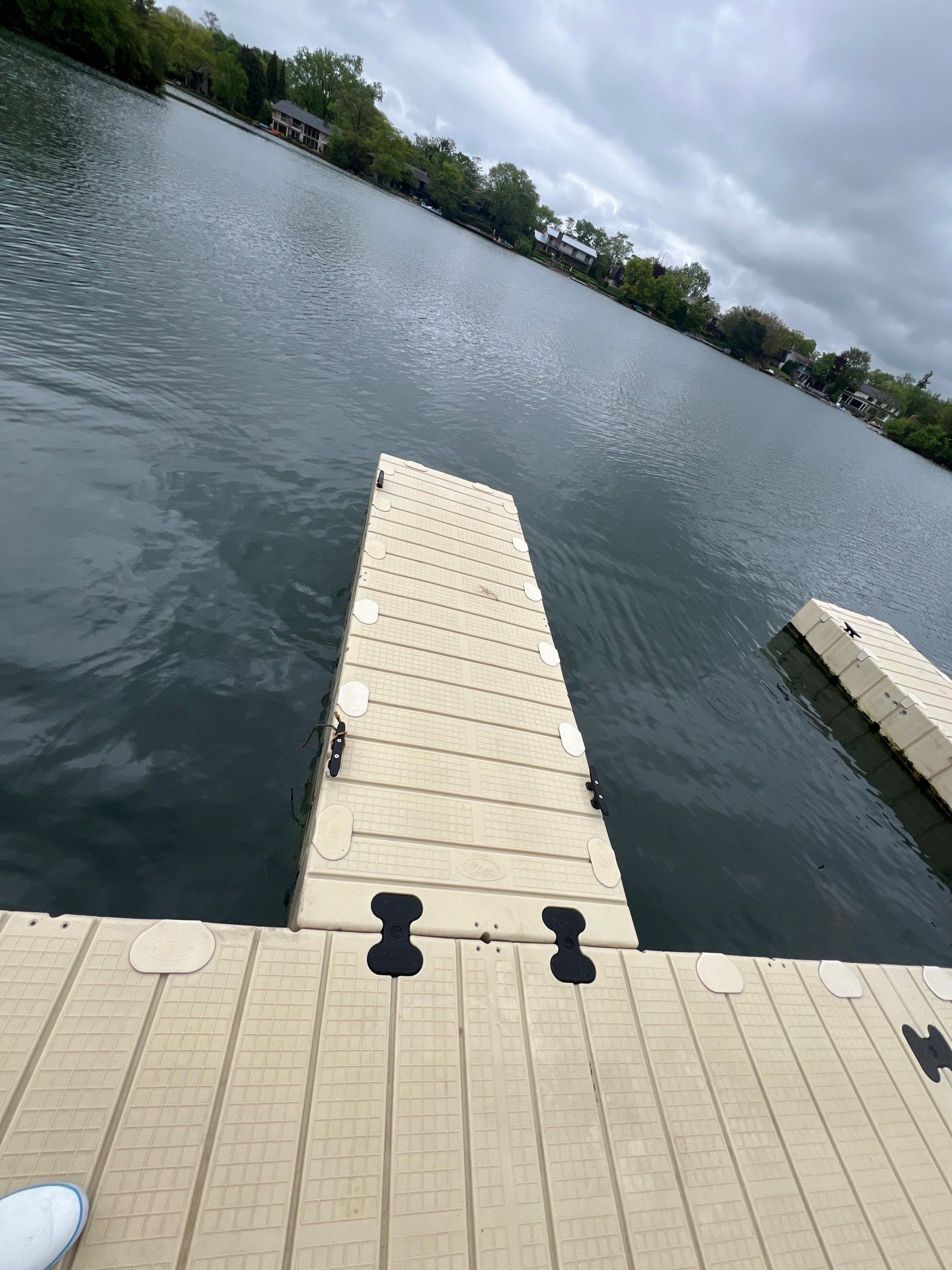 Power washing of floating dock by Northern Power Washing LLC.