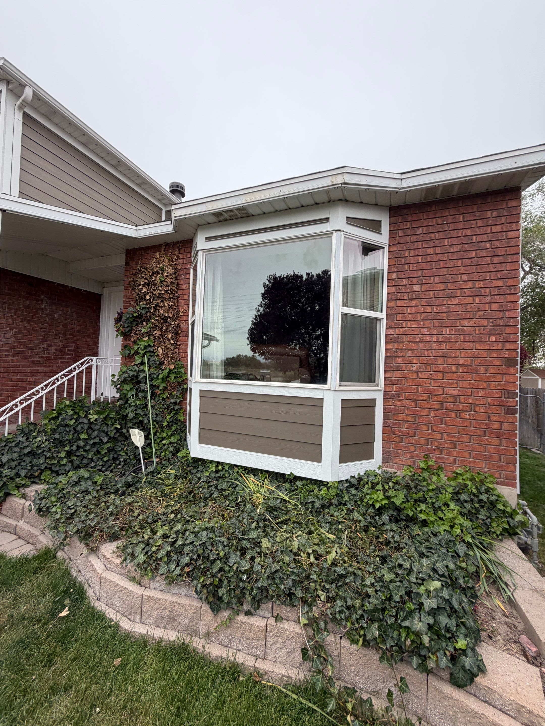 West Valley City | Aluminum to Hardie Conversion | Timber Bark & Arctic White by Ideal Siding Utah