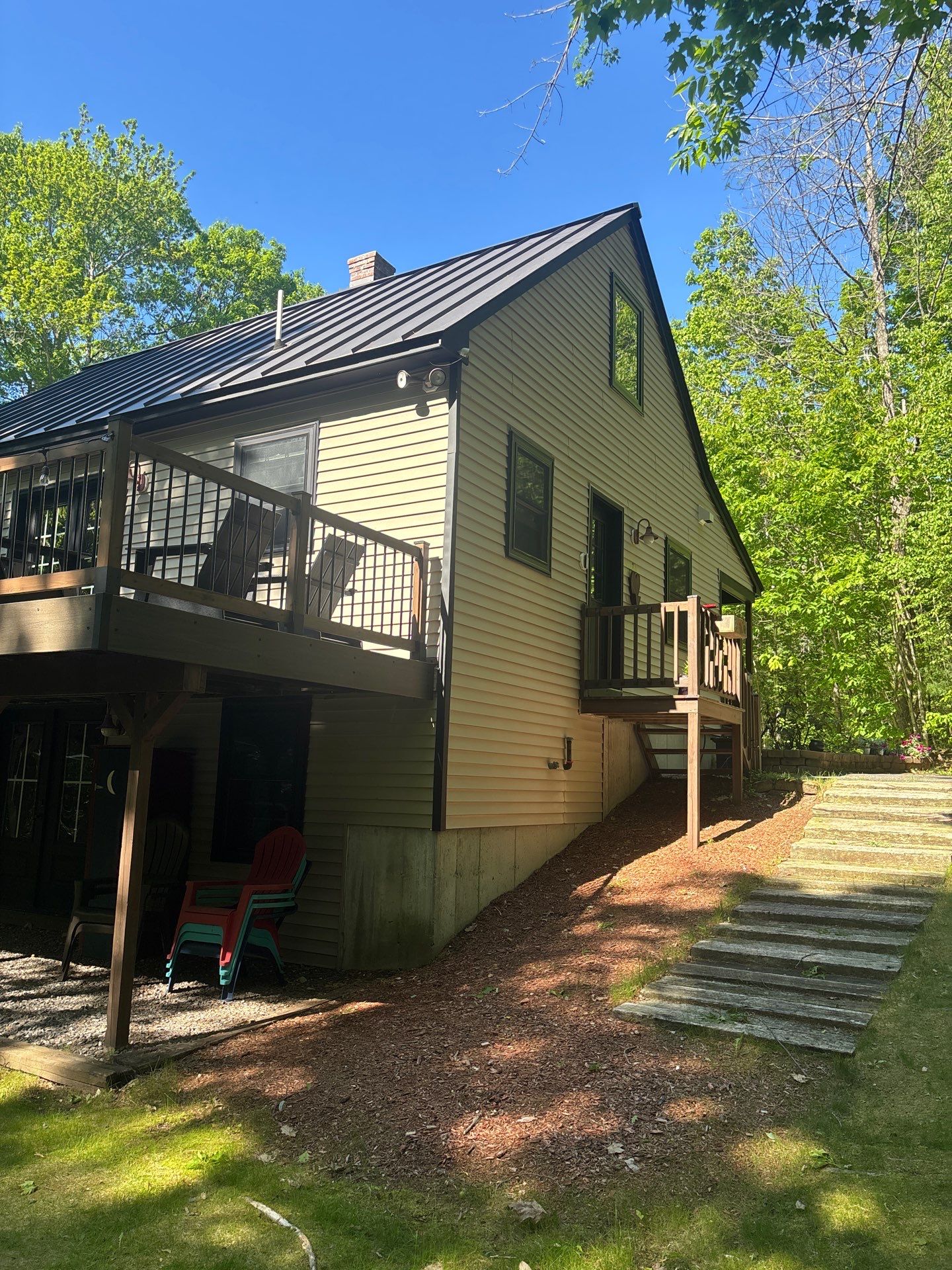 Sage Green Board and Batten Siding and Deck Upgrade in Standish by Tall pine roofing