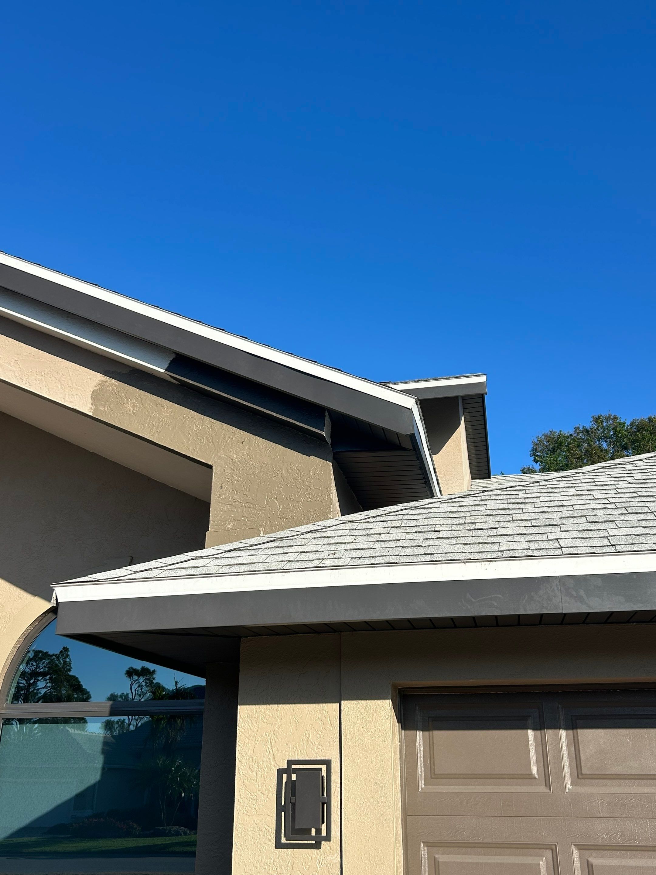 Black Seamless Gutters in Sarasota FL by Gutter Professors