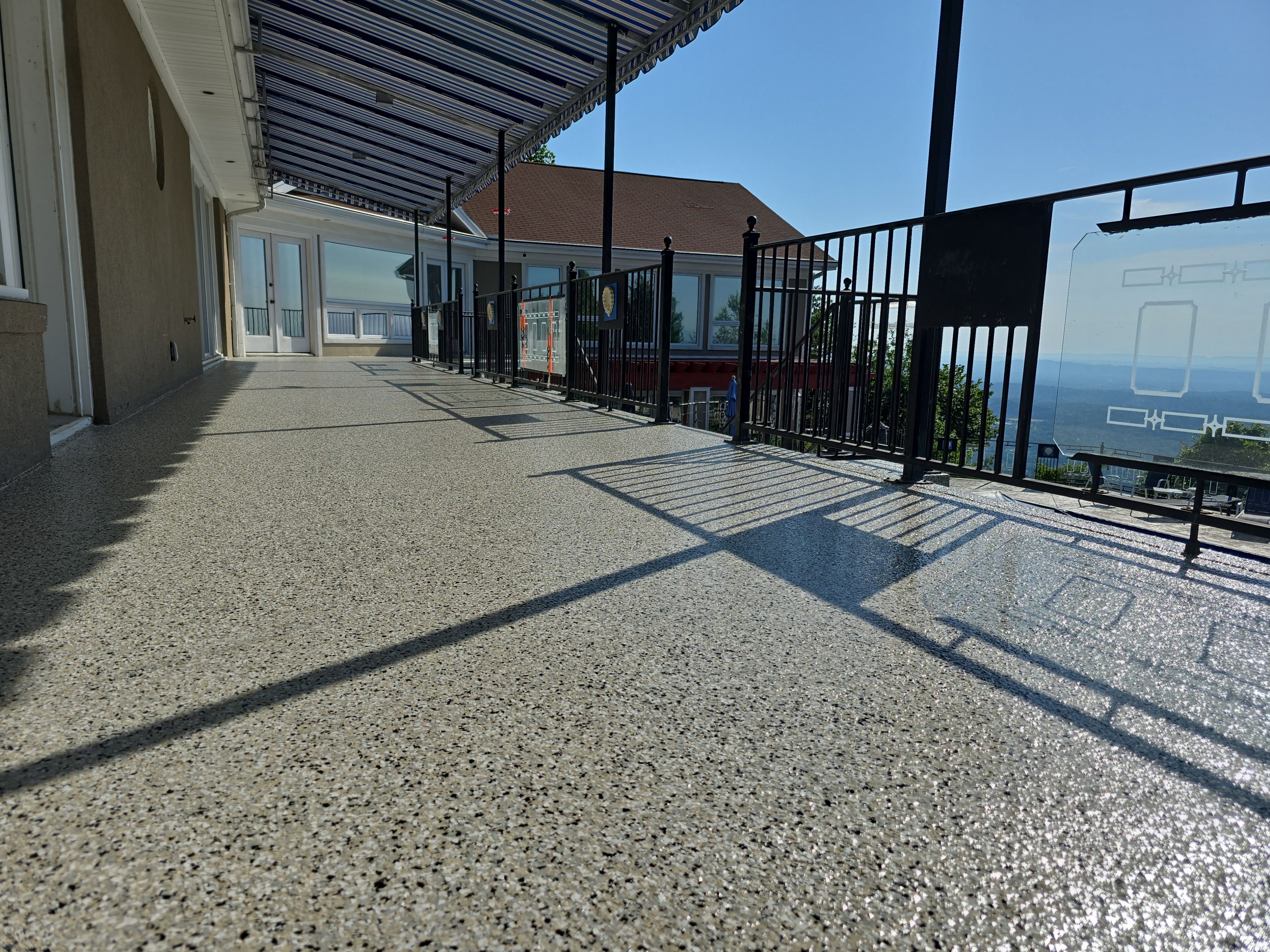Epic Patio Remodel with a stunning view! by Elite Floor Solutions