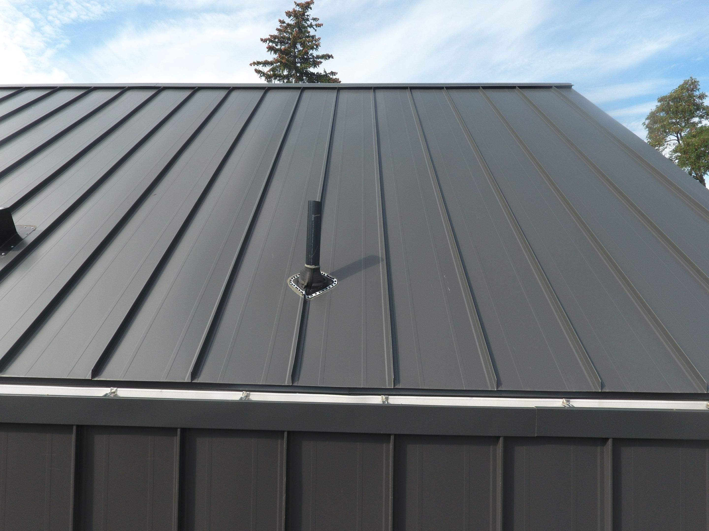 New Home Construction using 16" Standing Seam Panels by Jay Carter Roofing & Sheet Metal