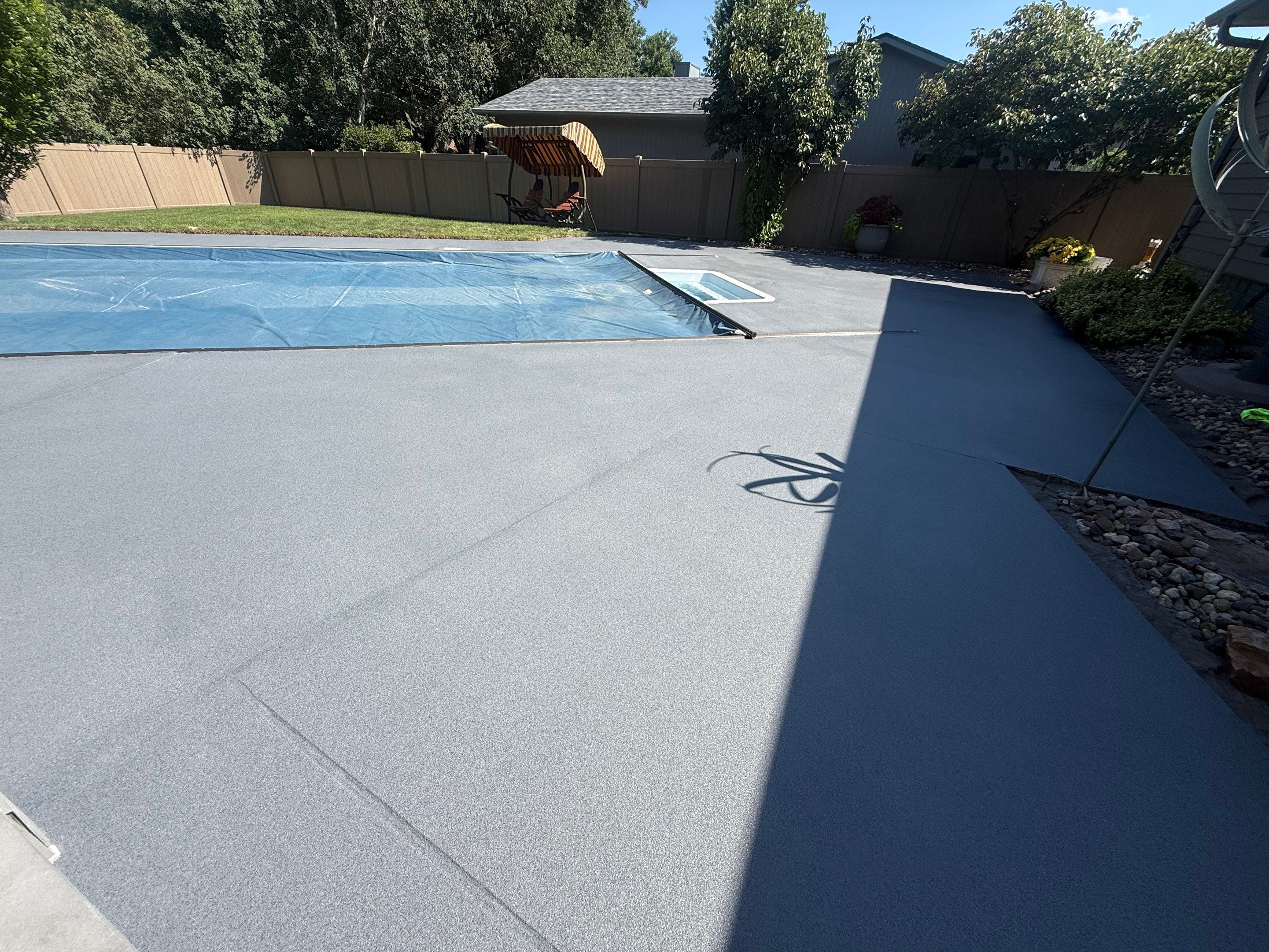 Residential Pool Deck Resurfacing in Sioux Falls by Select Painting, Coatings & Garage Cabinets