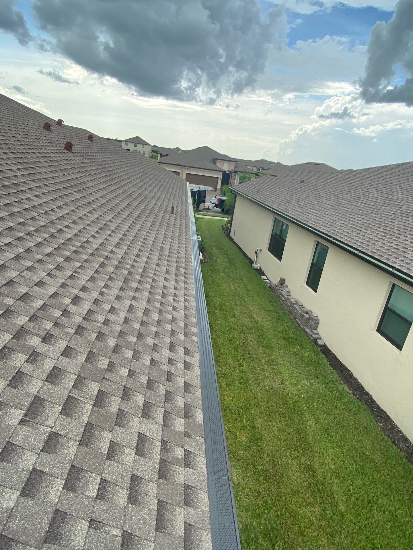 Brown Seamless Gutters for Homes in Fort Myers by Gutter Professors