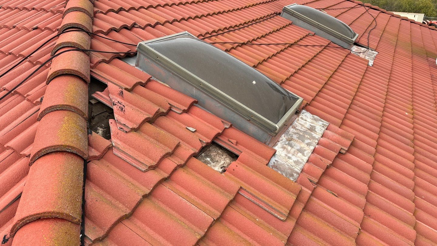 Tile refurbish project using existing tiles and replaced underlayment and battens by Straight Edge Roofing Inc