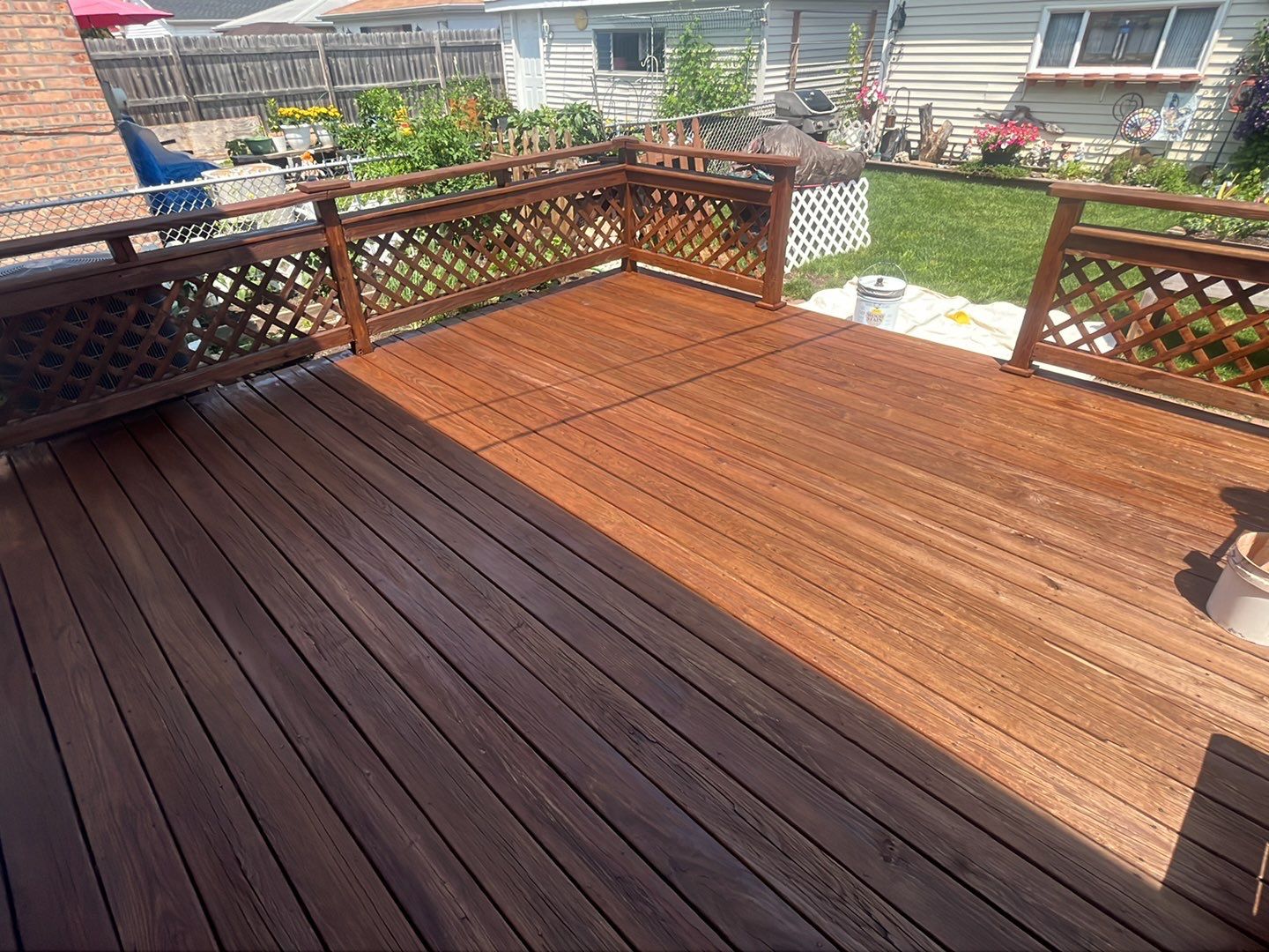 Wood cleaning and staining using Armstrong cloark oil stain by Northern Power Washing LLC.