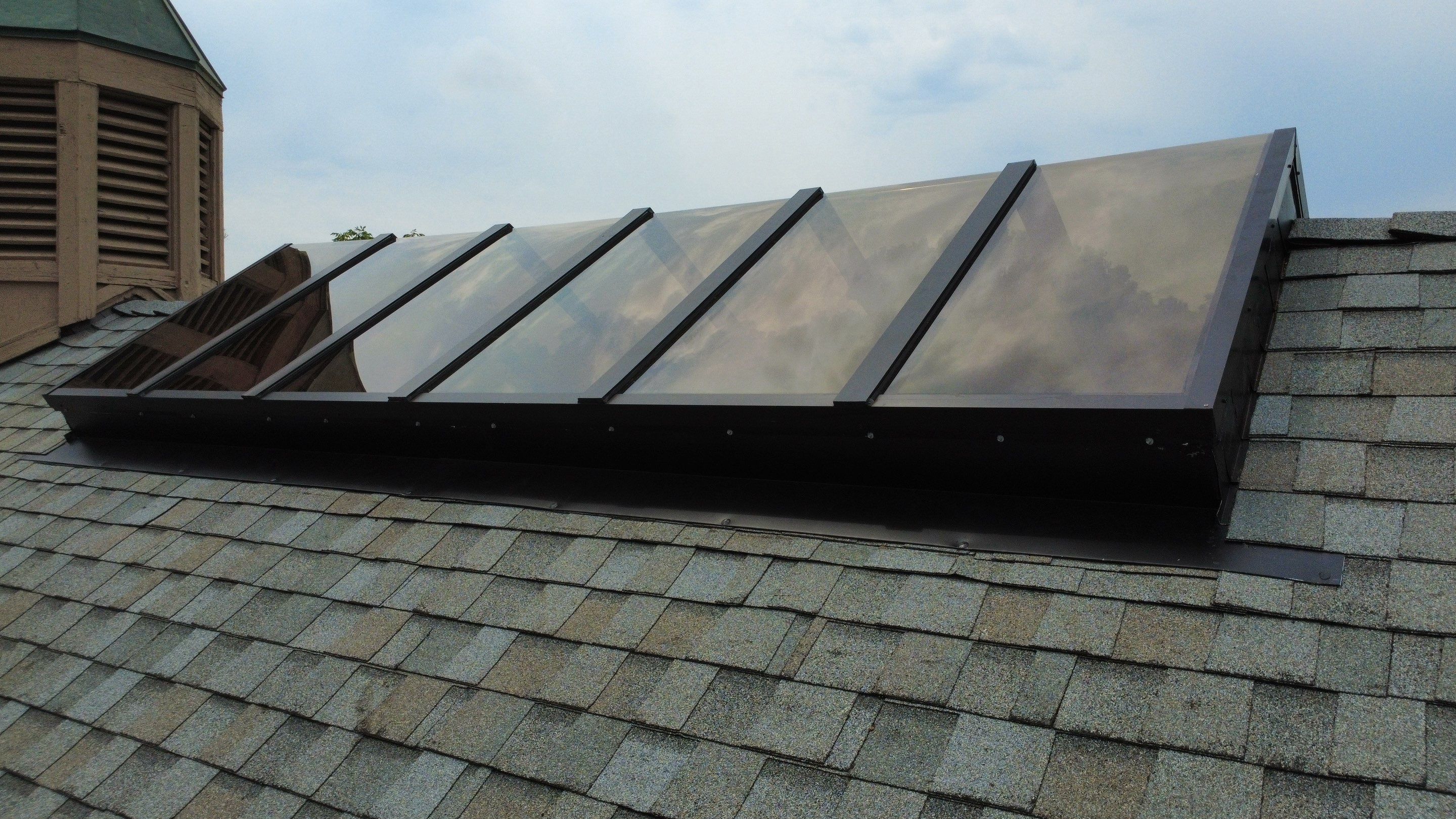 Asphalt Shingle and Skylight Replacement Project in Denver, CO by Blue Peaks Roofing LLC 