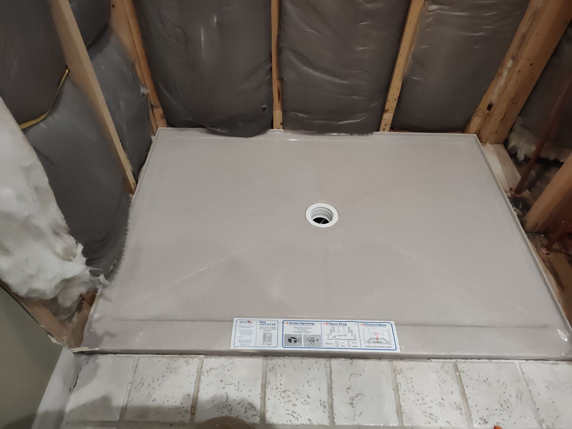 Bathroom Remodel using Onyx by Cornerstone Home Builders, LLC