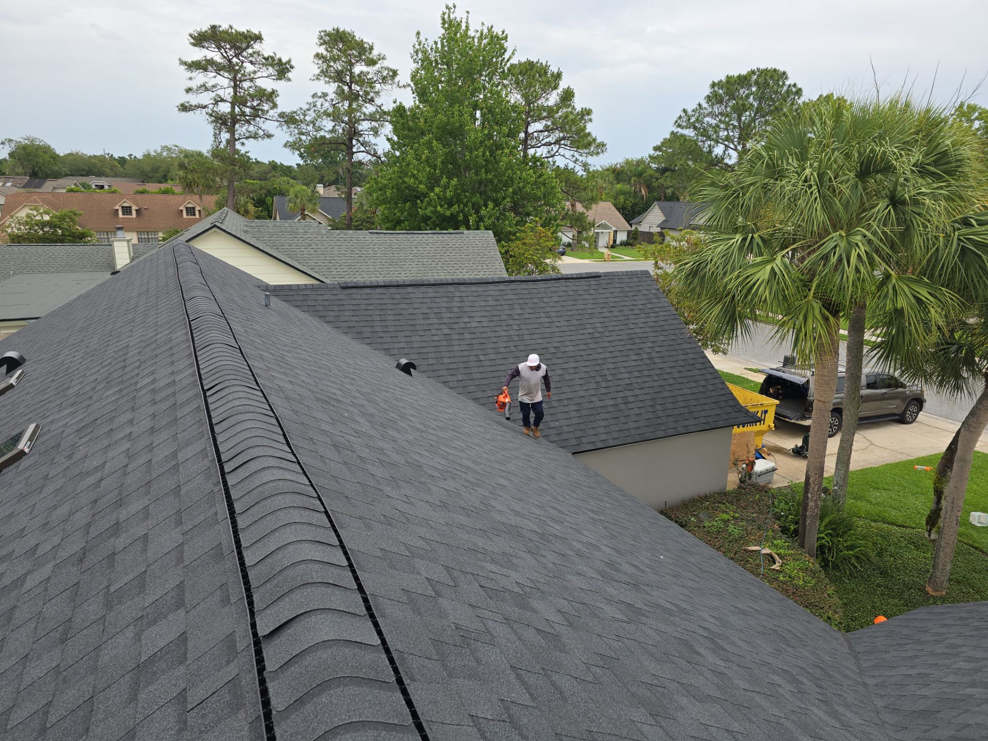 Asphalt Architectural Shingle Roof Replacement and Solar Integration in Longwood by Fortified Roofing Solutions Corp.