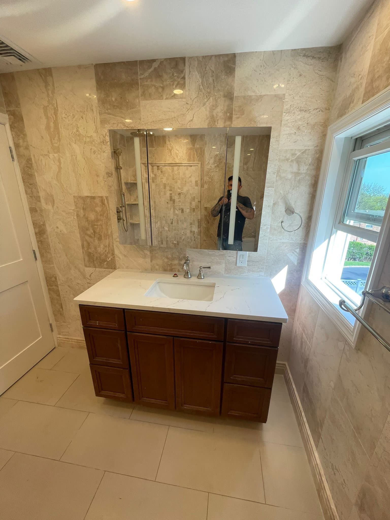 Bathroom Remodel using Tile by Home Concepts Construction