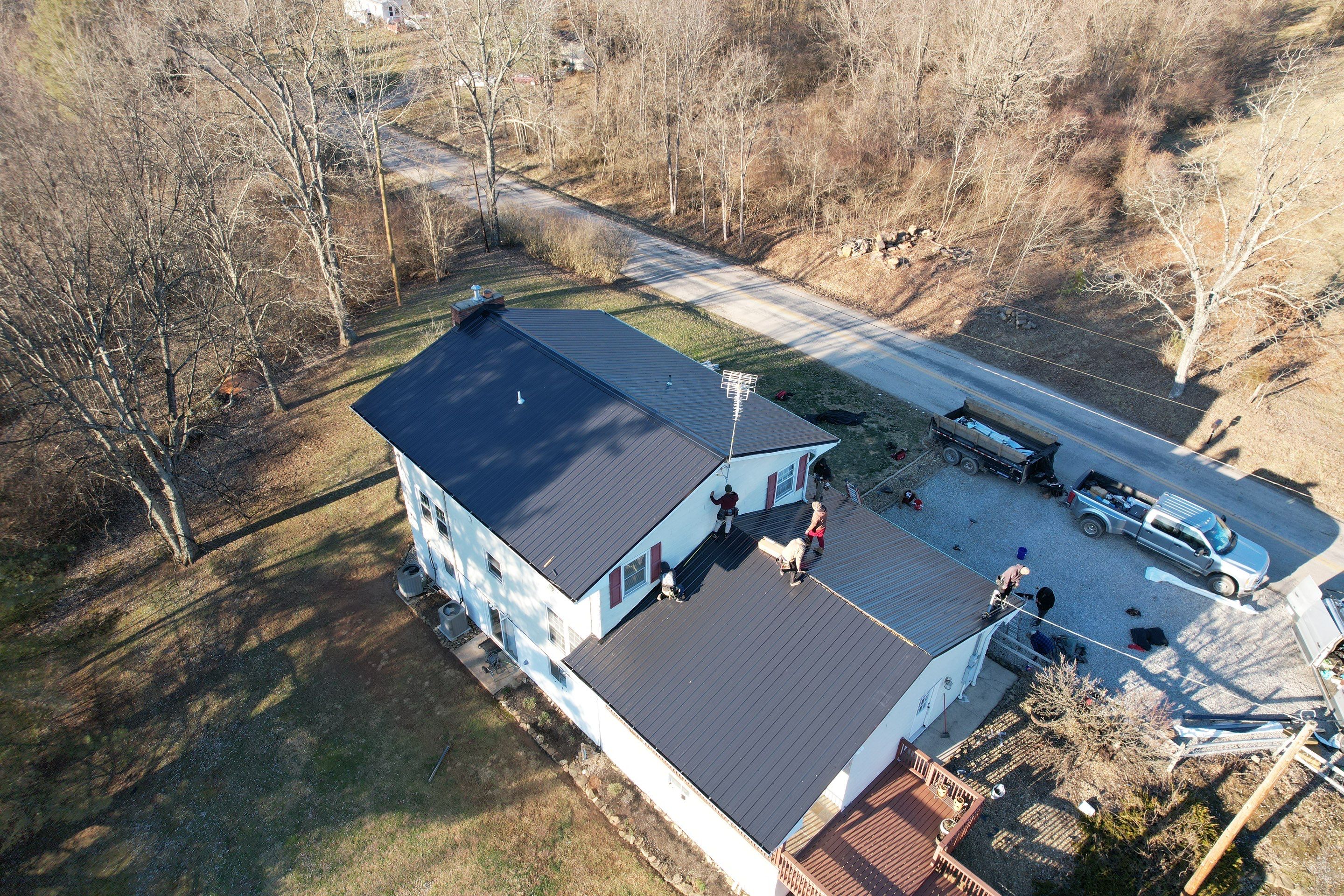 Residential Roofing Installation using Metal by Rainstoppers Roofing