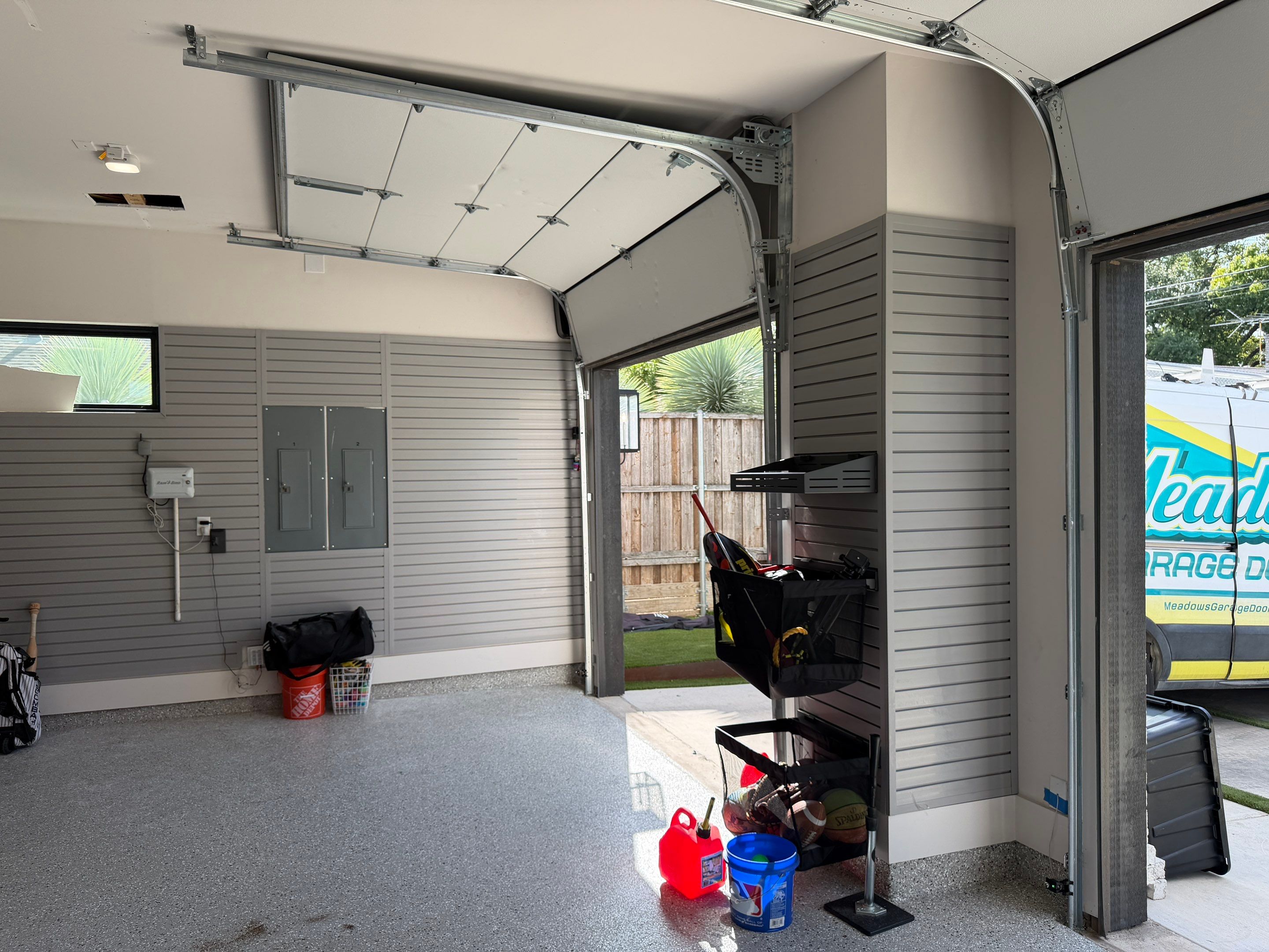 High-Lift Garage Door Conversion and LiftMaster Opener Installation in Dallas by Meadows Garage Doors